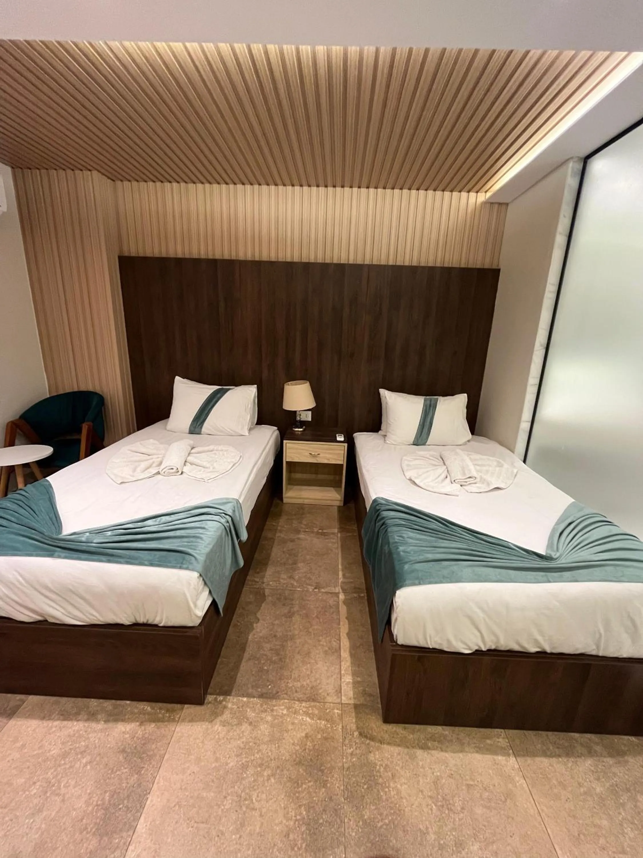 Bed in Blue Pyramids Eyes Hotel