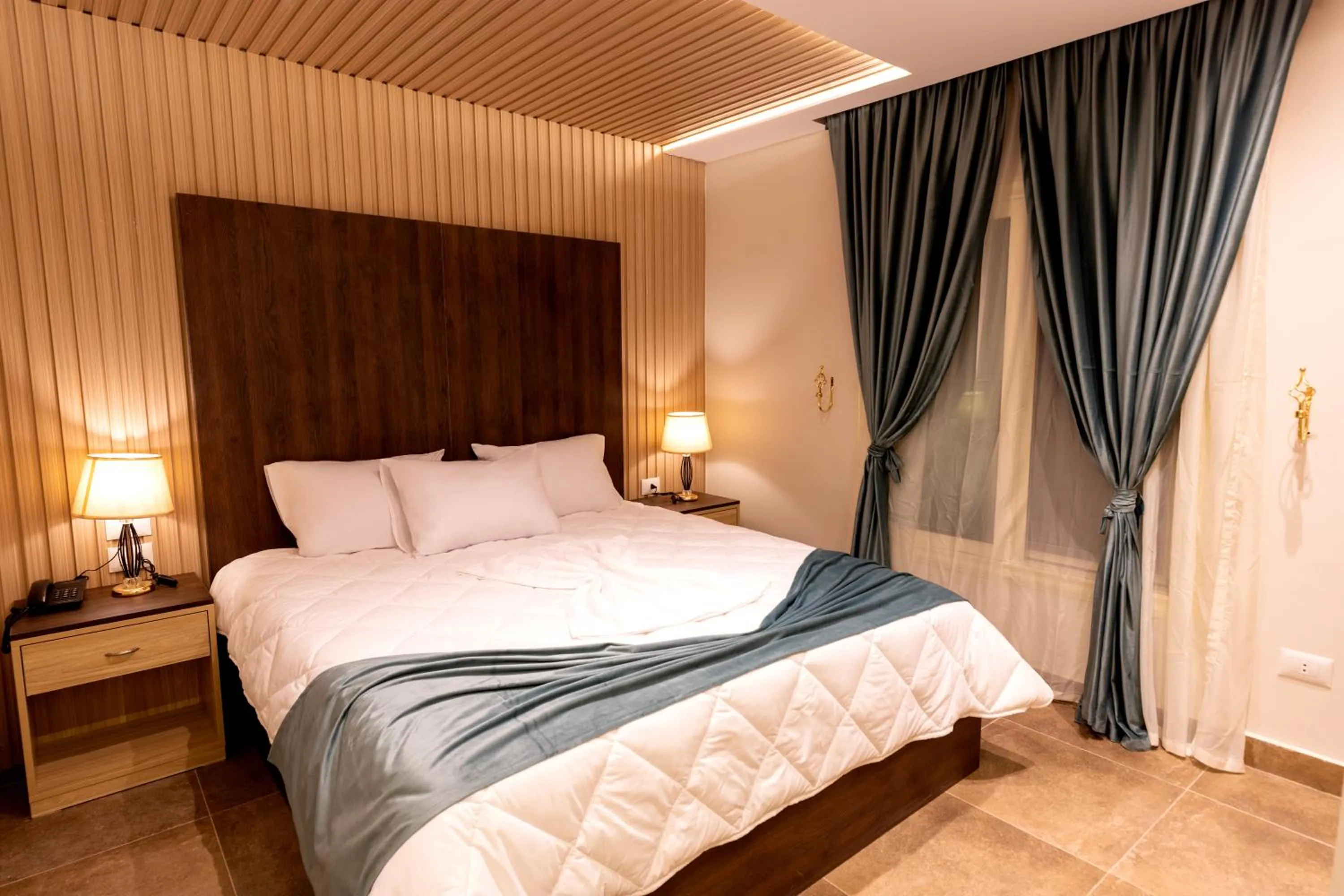 Bed in Blue Pyramids Eyes Hotel