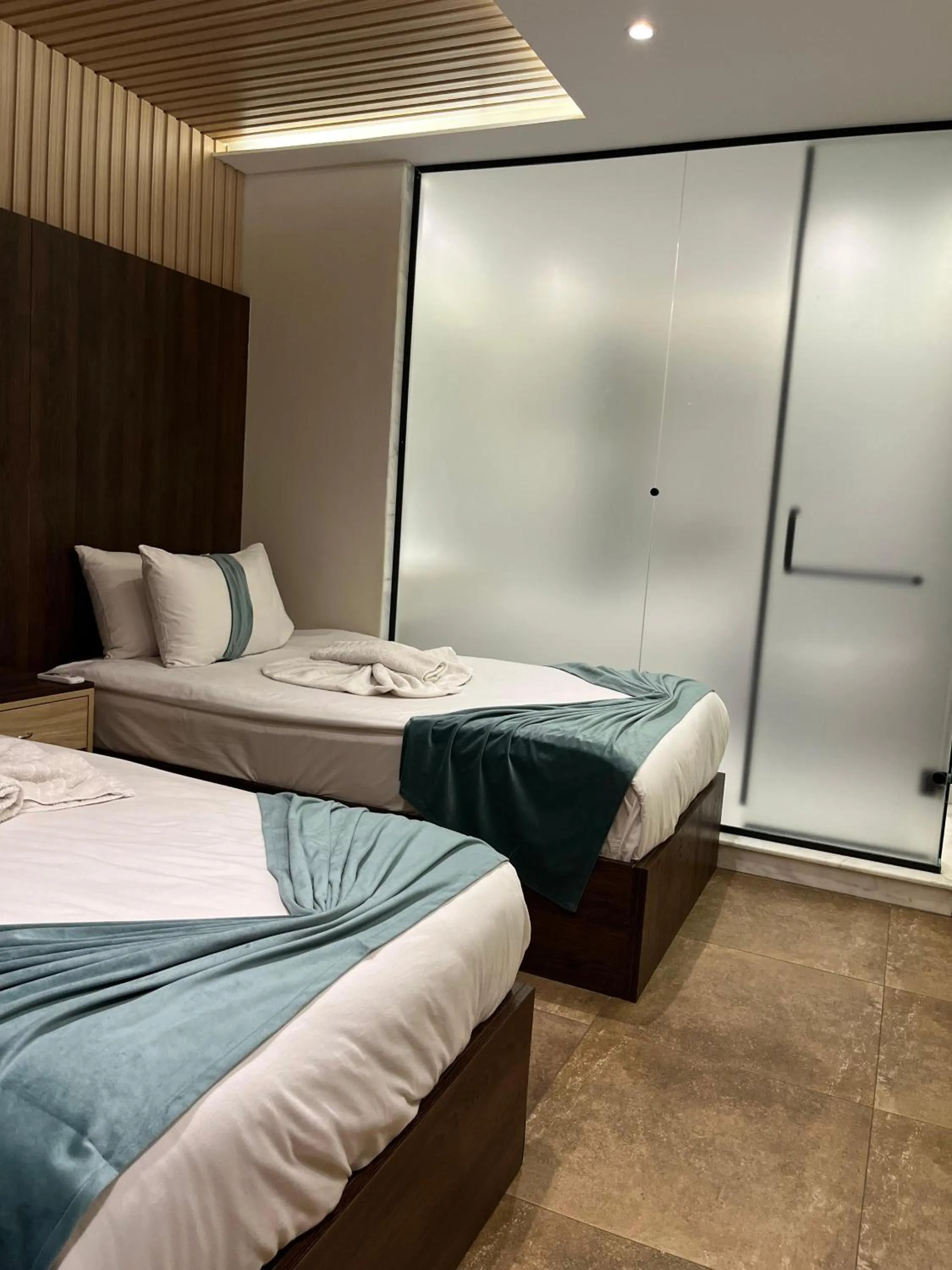 Bed in Blue Pyramids Eyes Hotel