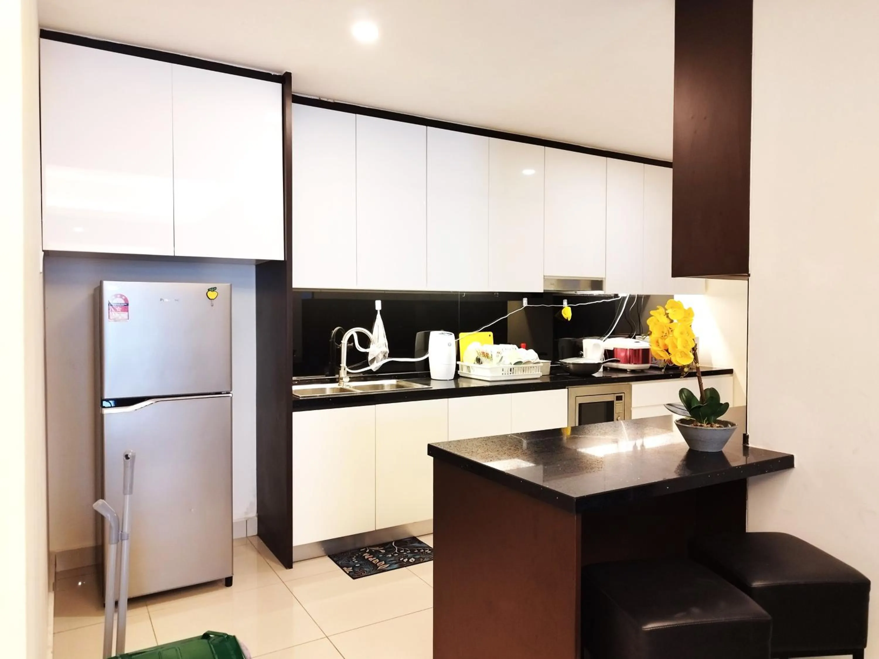 Kitchen or kitchenette in GENTING FoggyCold StayCation AT Ion Delemen By HAPYHOME