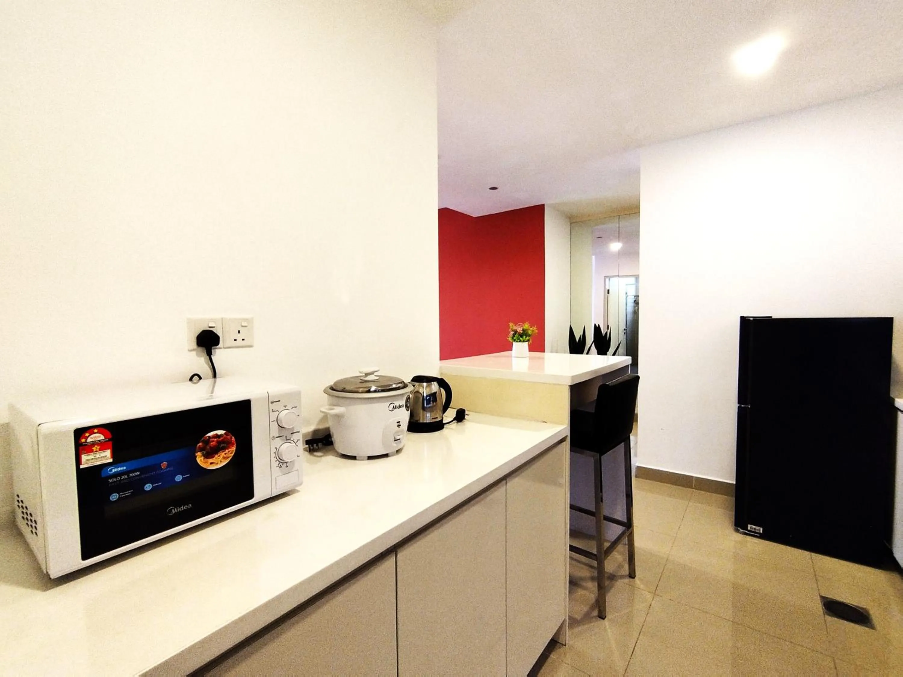 Kitchen or kitchenette in GENTING FoggyCold StayCation AT Ion Delemen By HAPYHOME