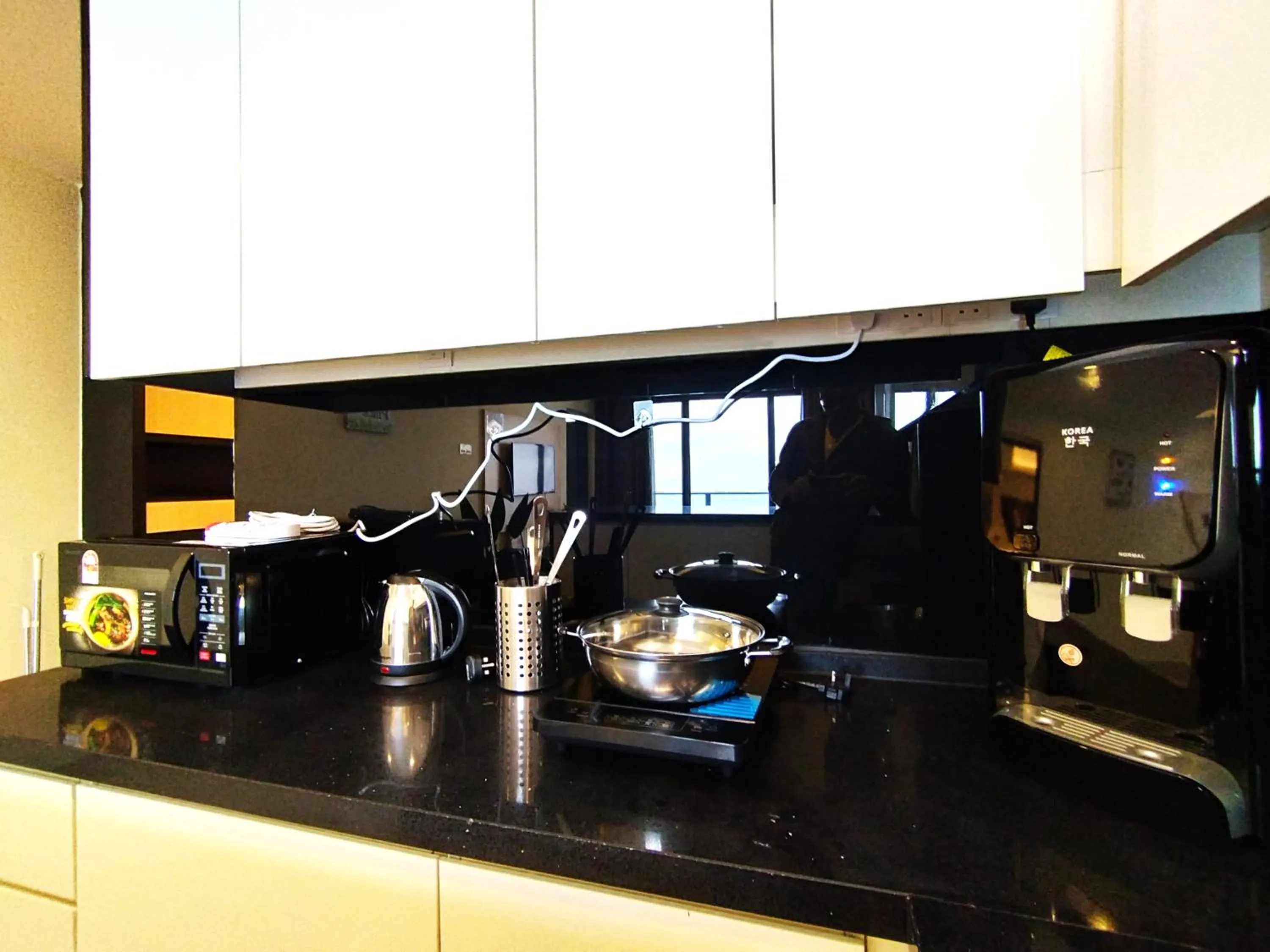 Kitchen or kitchenette in GENTING FoggyCold StayCation AT Ion Delemen By HAPYHOME