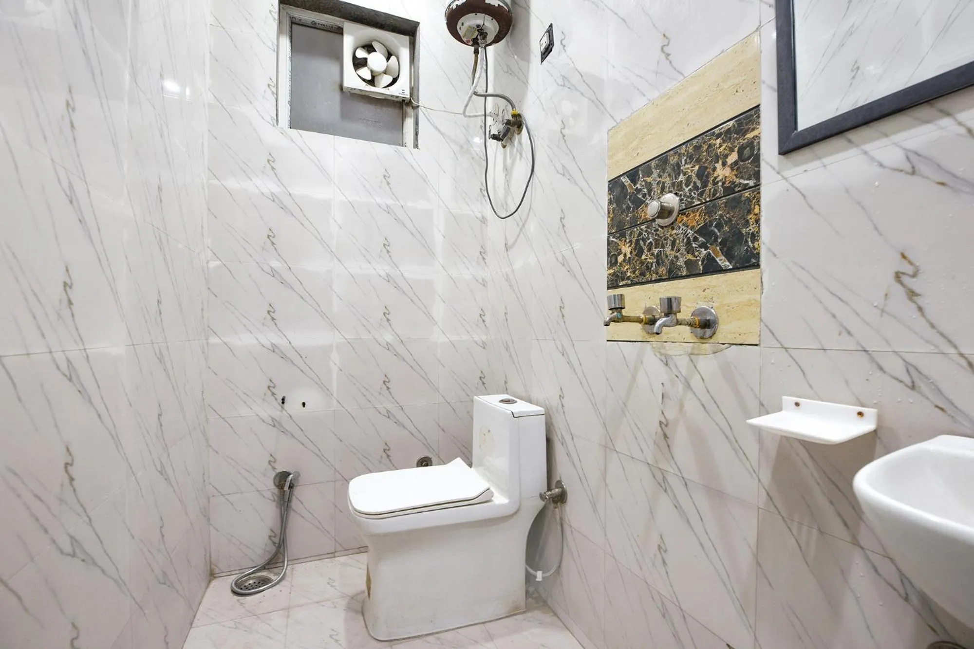 Bathroom in FabHotel Royal Reena Residency