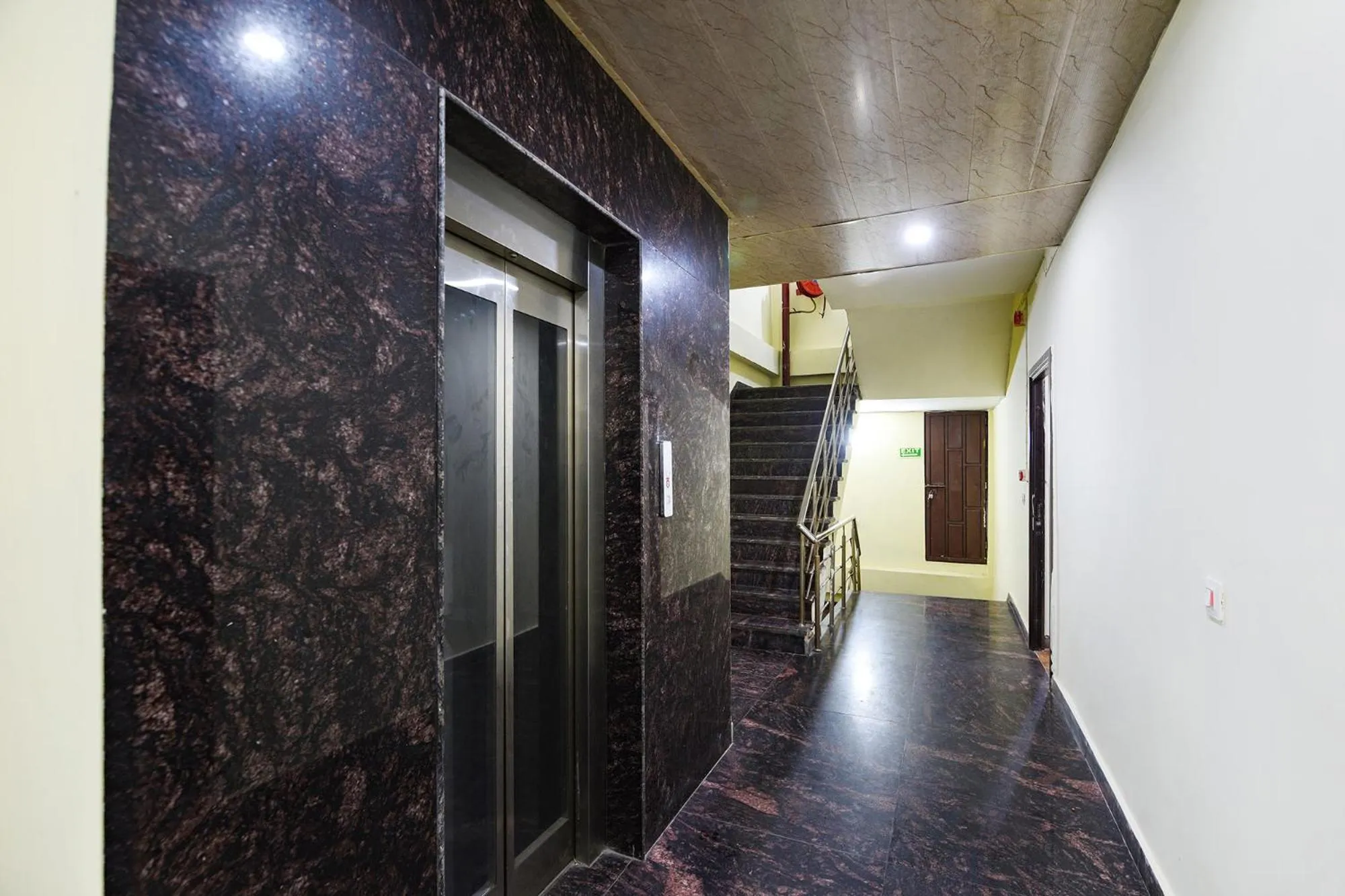 elevator in FabHotel Royal Reena Residency