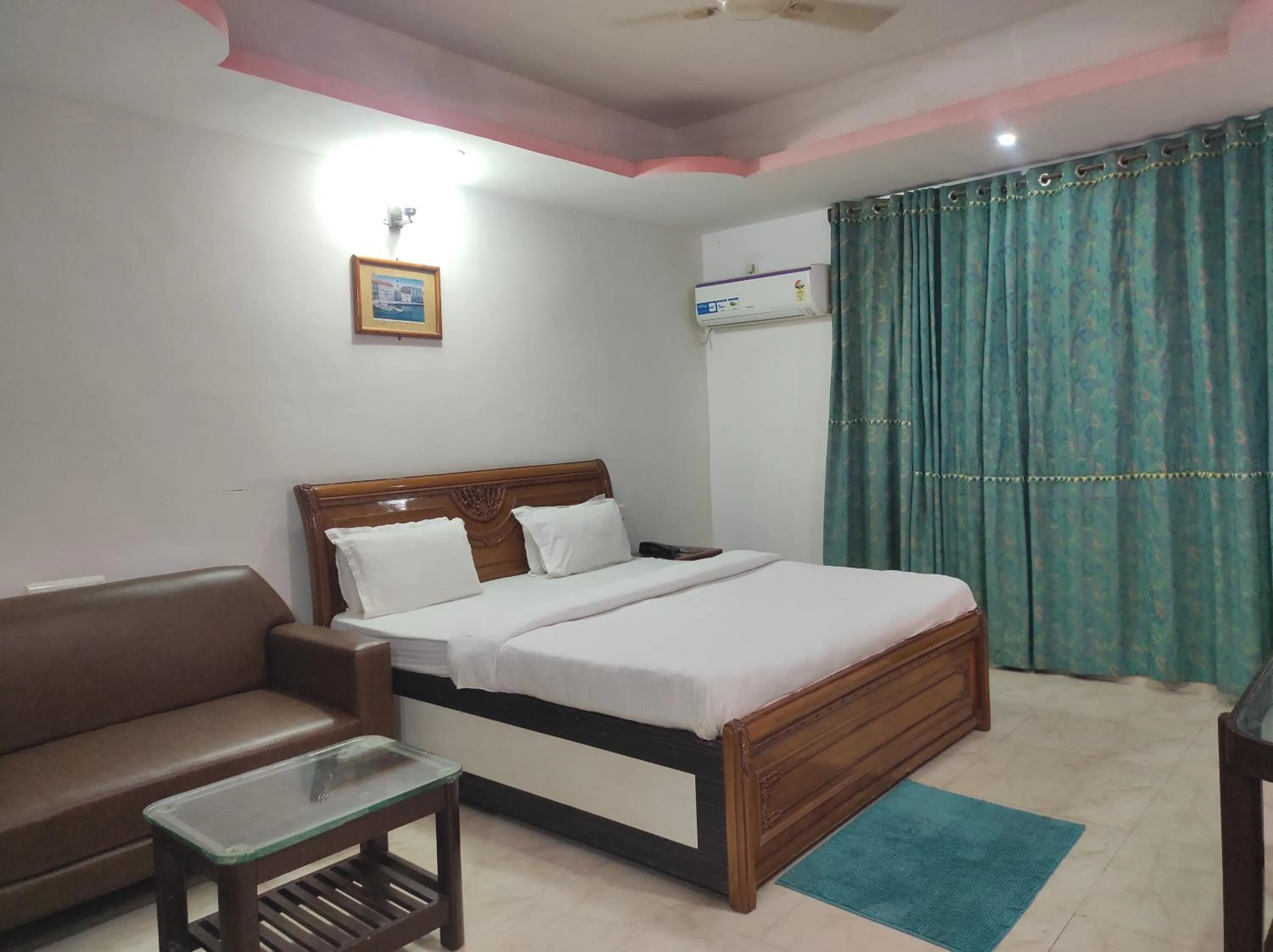 Bed in Hotel Sanjivani Heritage Top Best Budget Hotels in Dibrugarh, Assam