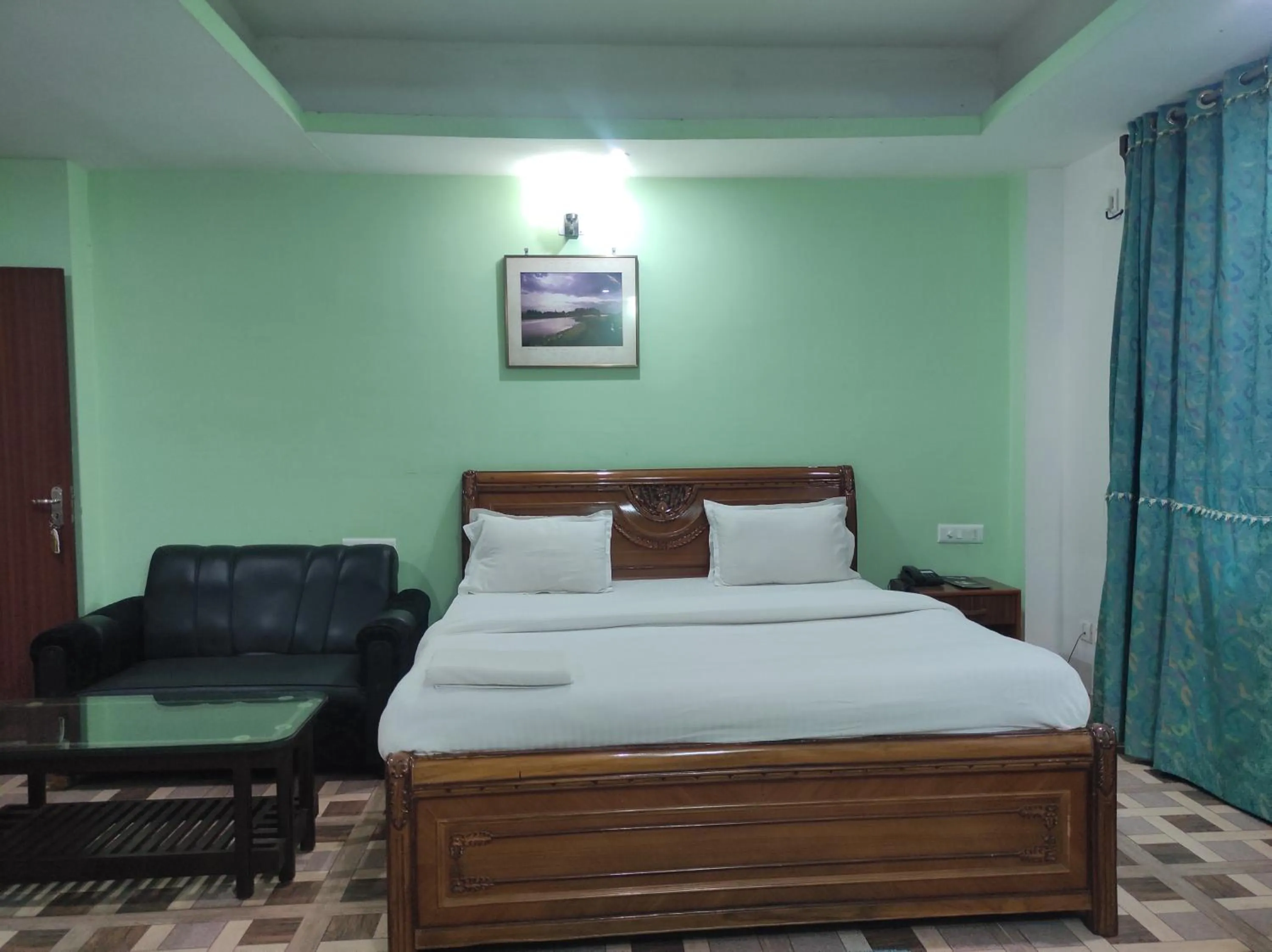 Bed in Hotel Sanjivani Heritage Top Best Budget Hotels in Dibrugarh, Assam