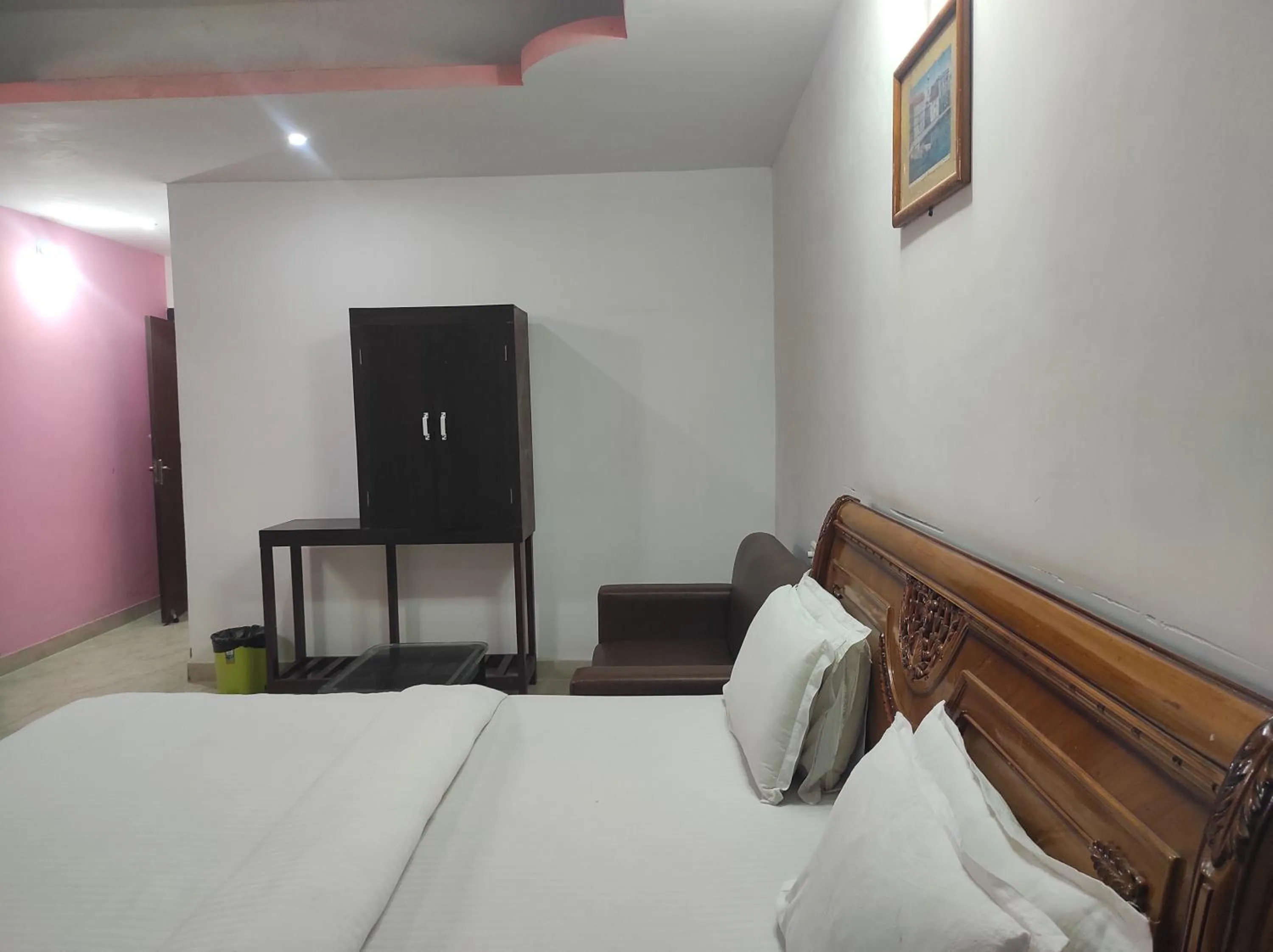 Bed in Hotel Sanjivani Heritage Top Best Budget Hotels in Dibrugarh, Assam