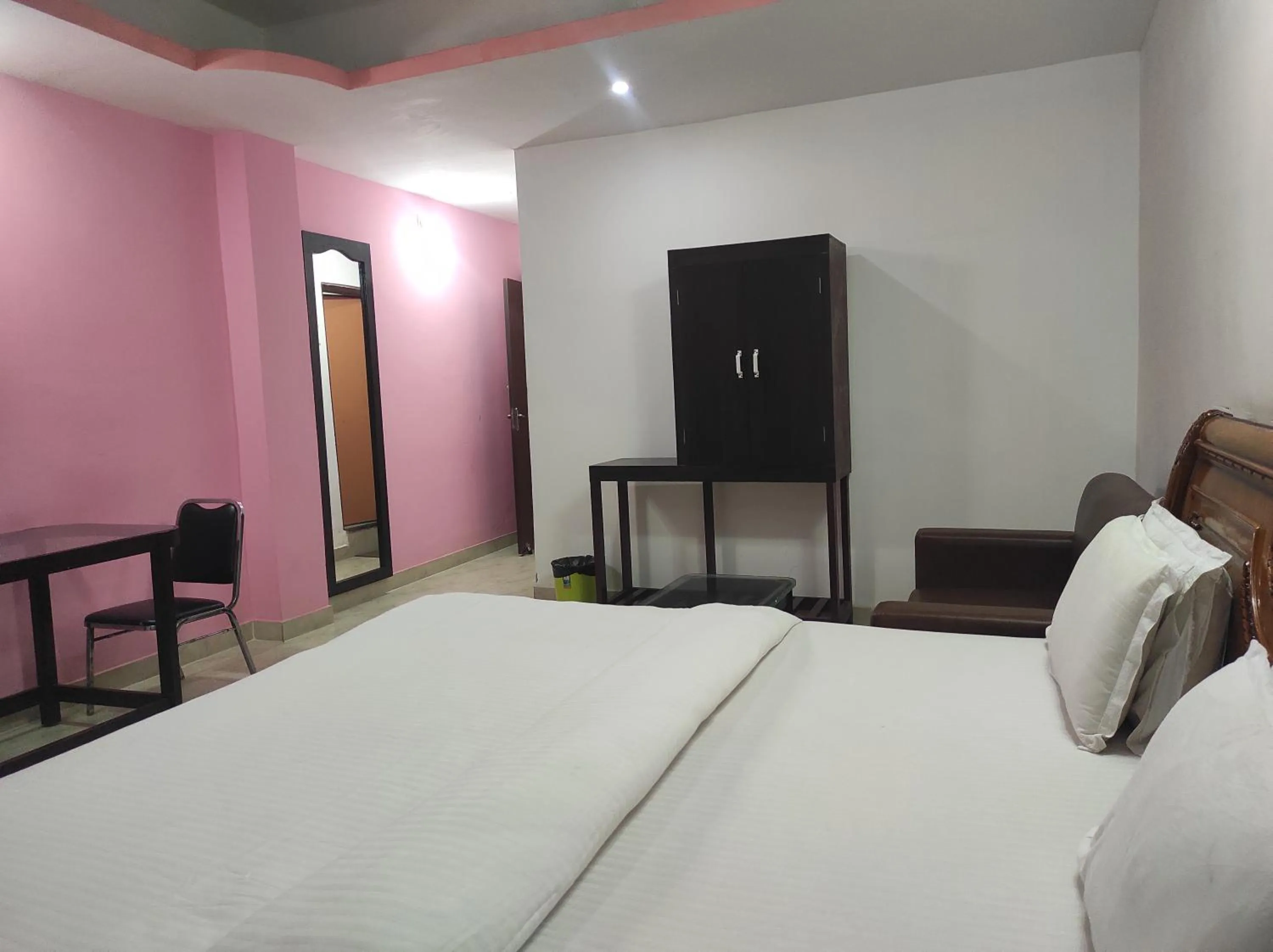Bed in Hotel Sanjivani Heritage Top Best Budget Hotels in Dibrugarh, Assam