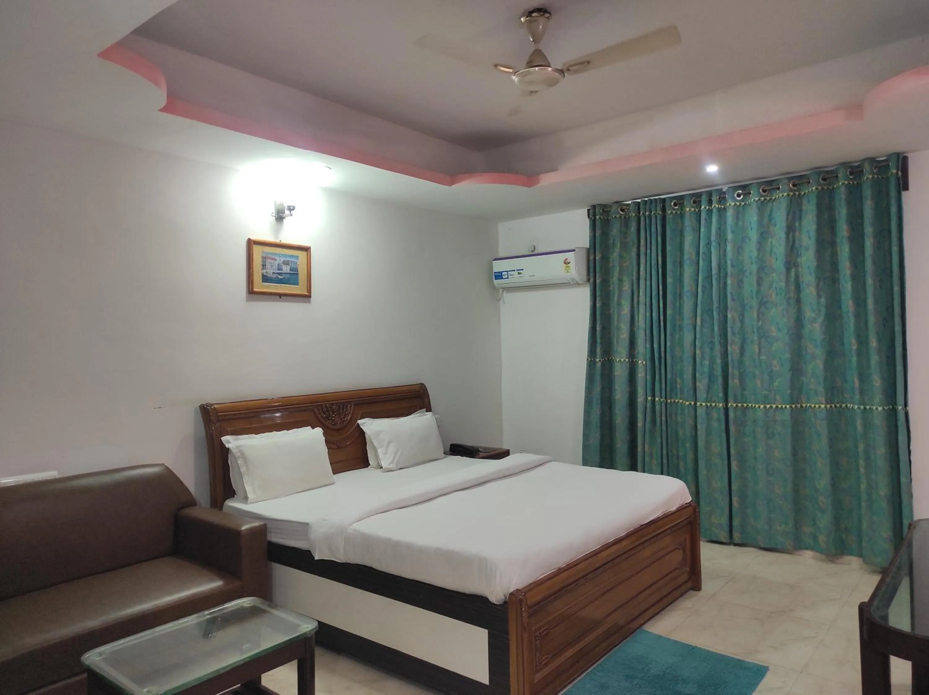 Bed in Hotel Sanjivani Heritage Top Best Budget Hotels in Dibrugarh, Assam