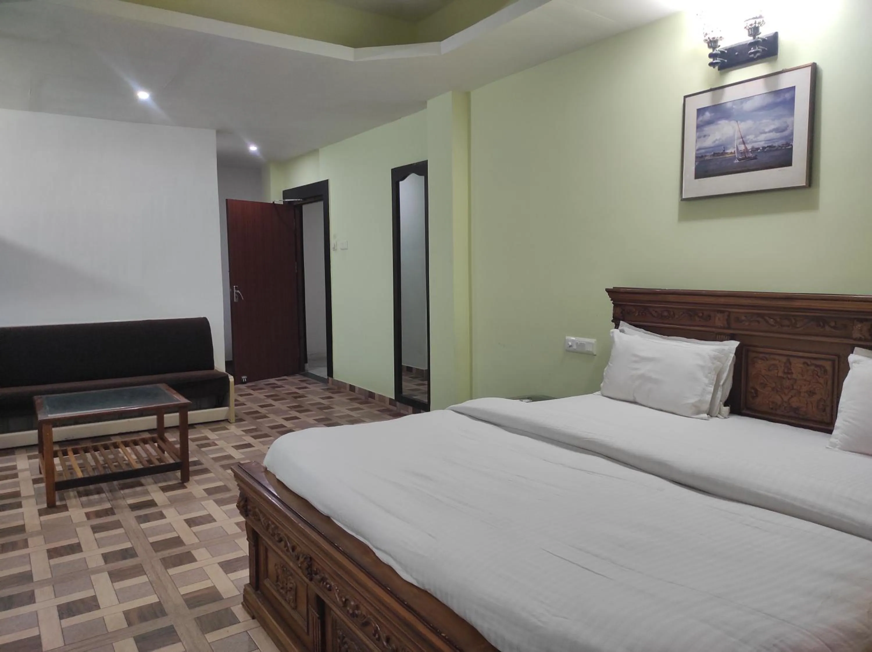 Bed in Hotel Sanjivani Heritage Top Best Budget Hotels in Dibrugarh, Assam