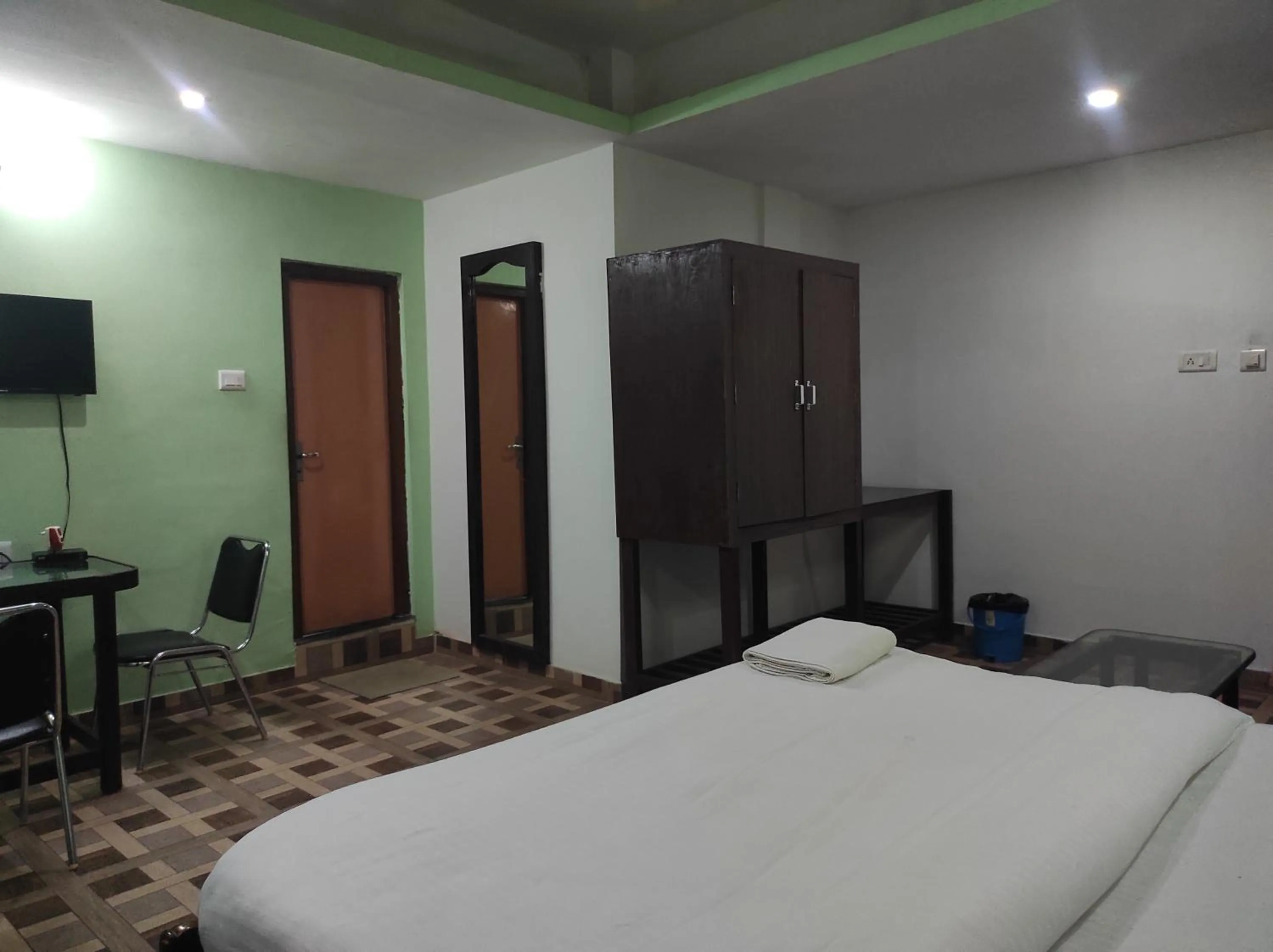 Bed in Hotel Sanjivani Heritage Top Best Budget Hotels in Dibrugarh, Assam