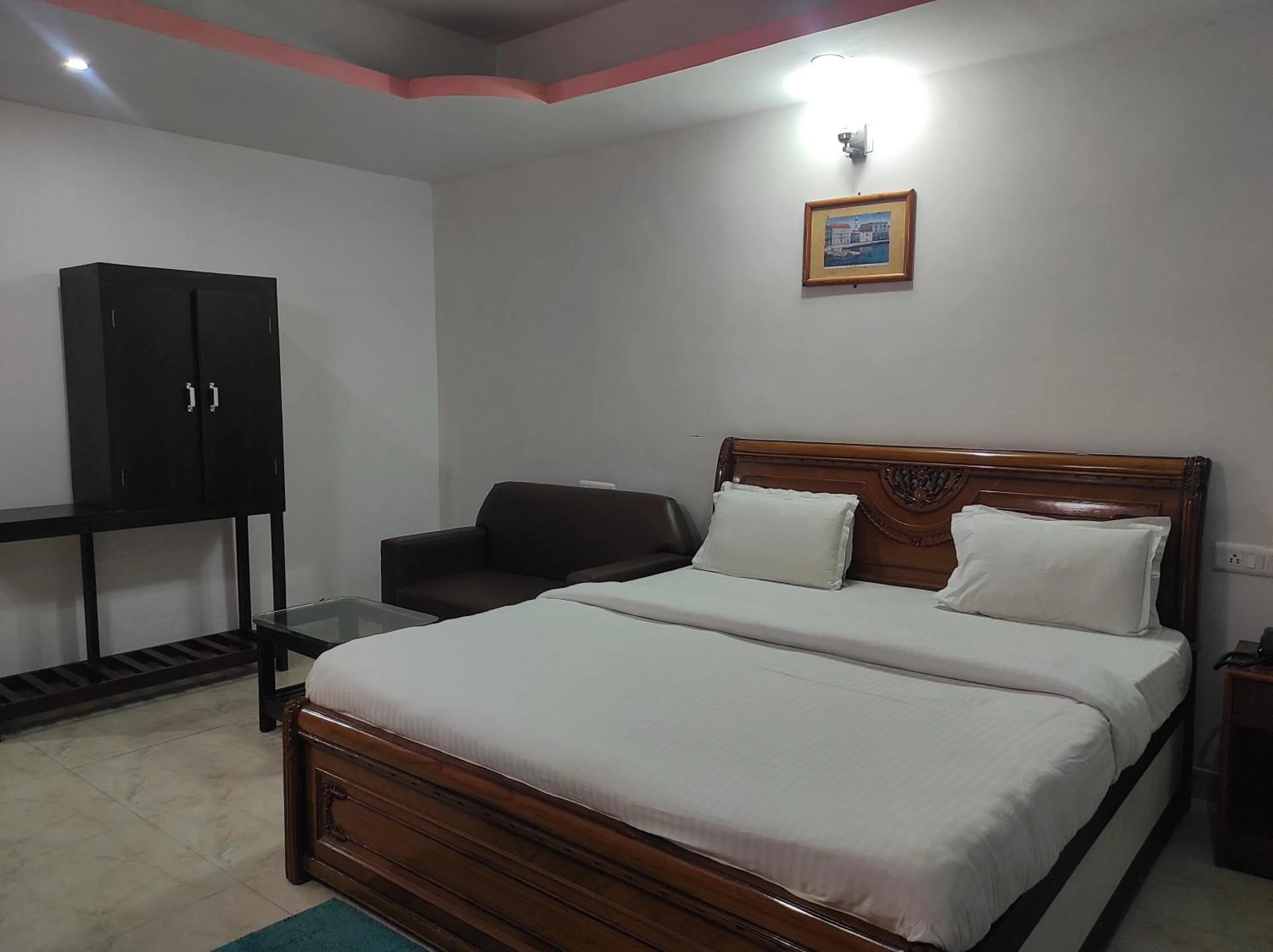 Bed in Hotel Sanjivani Heritage Top Best Budget Hotels in Dibrugarh, Assam