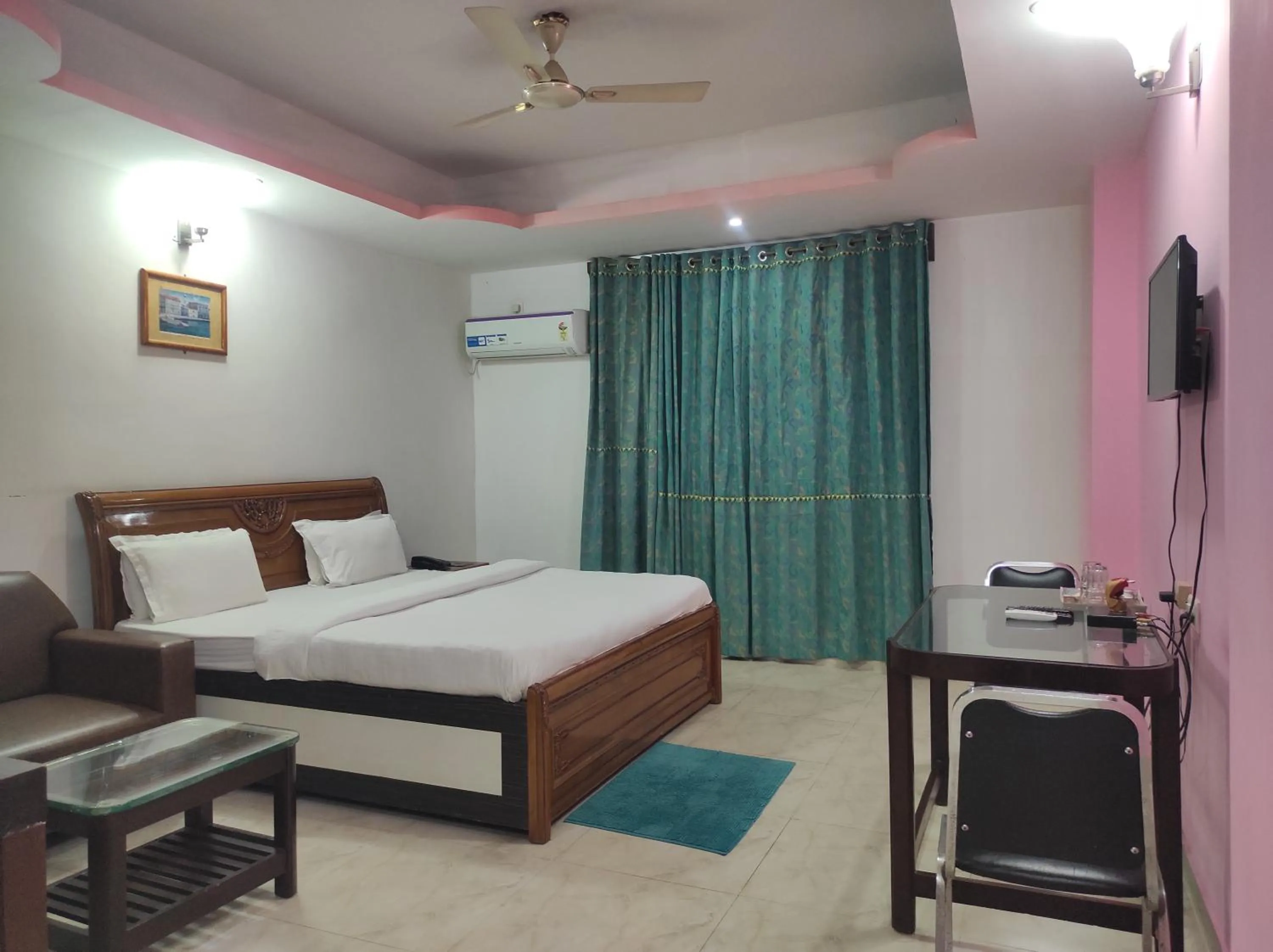 Bed in Hotel Sanjivani Heritage Top Best Budget Hotels in Dibrugarh, Assam