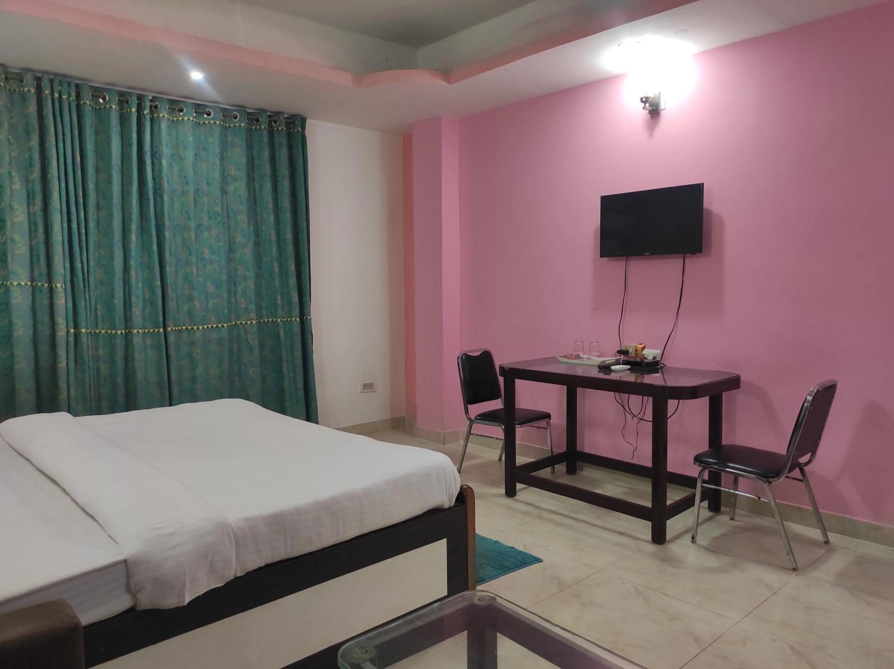 Bed in Hotel Sanjivani Heritage Top Best Budget Hotels in Dibrugarh, Assam