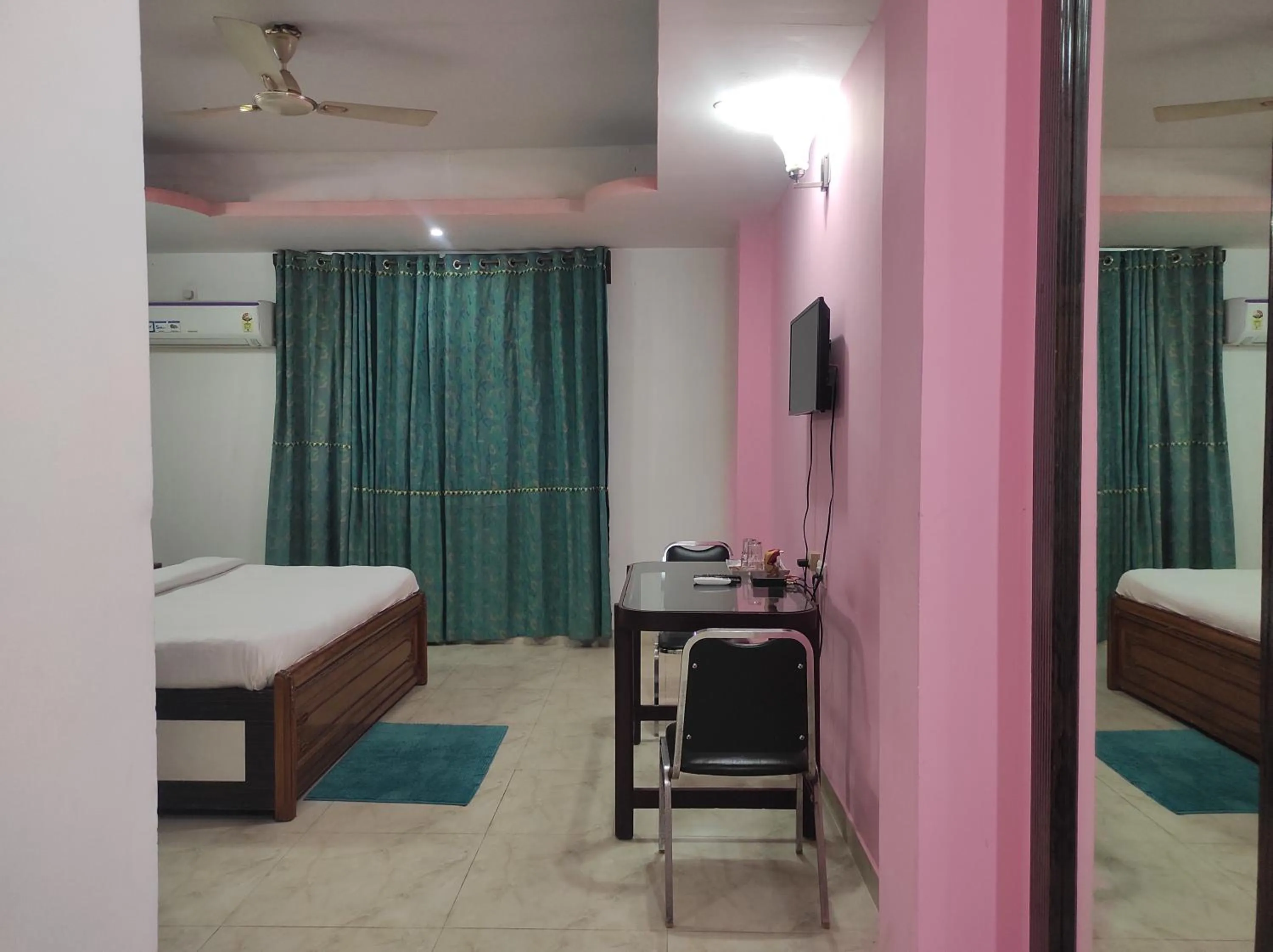 Bed in Hotel Sanjivani Heritage Top Best Budget Hotels in Dibrugarh, Assam