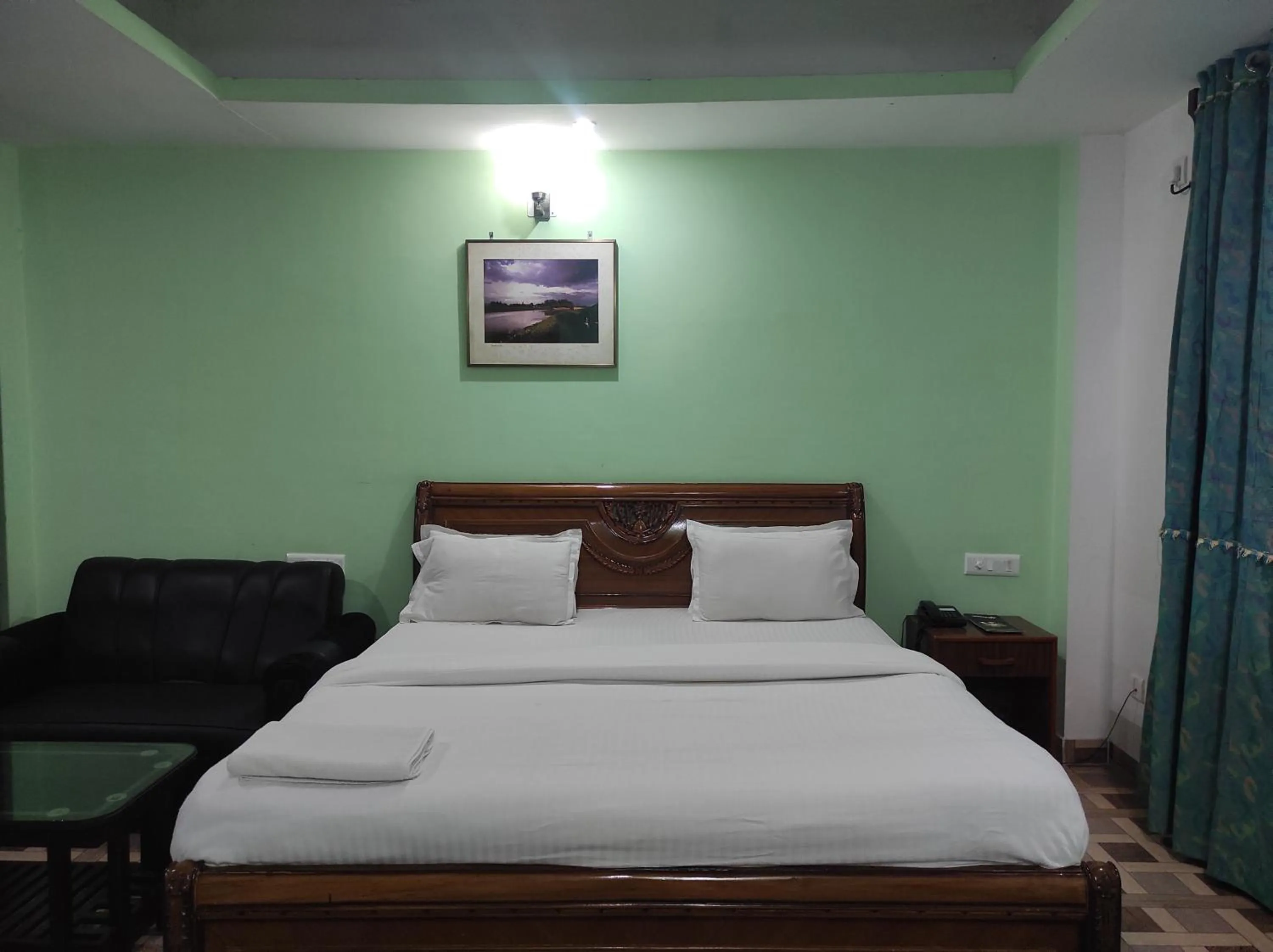 Bed in Hotel Sanjivani Heritage Top Best Budget Hotels in Dibrugarh, Assam
