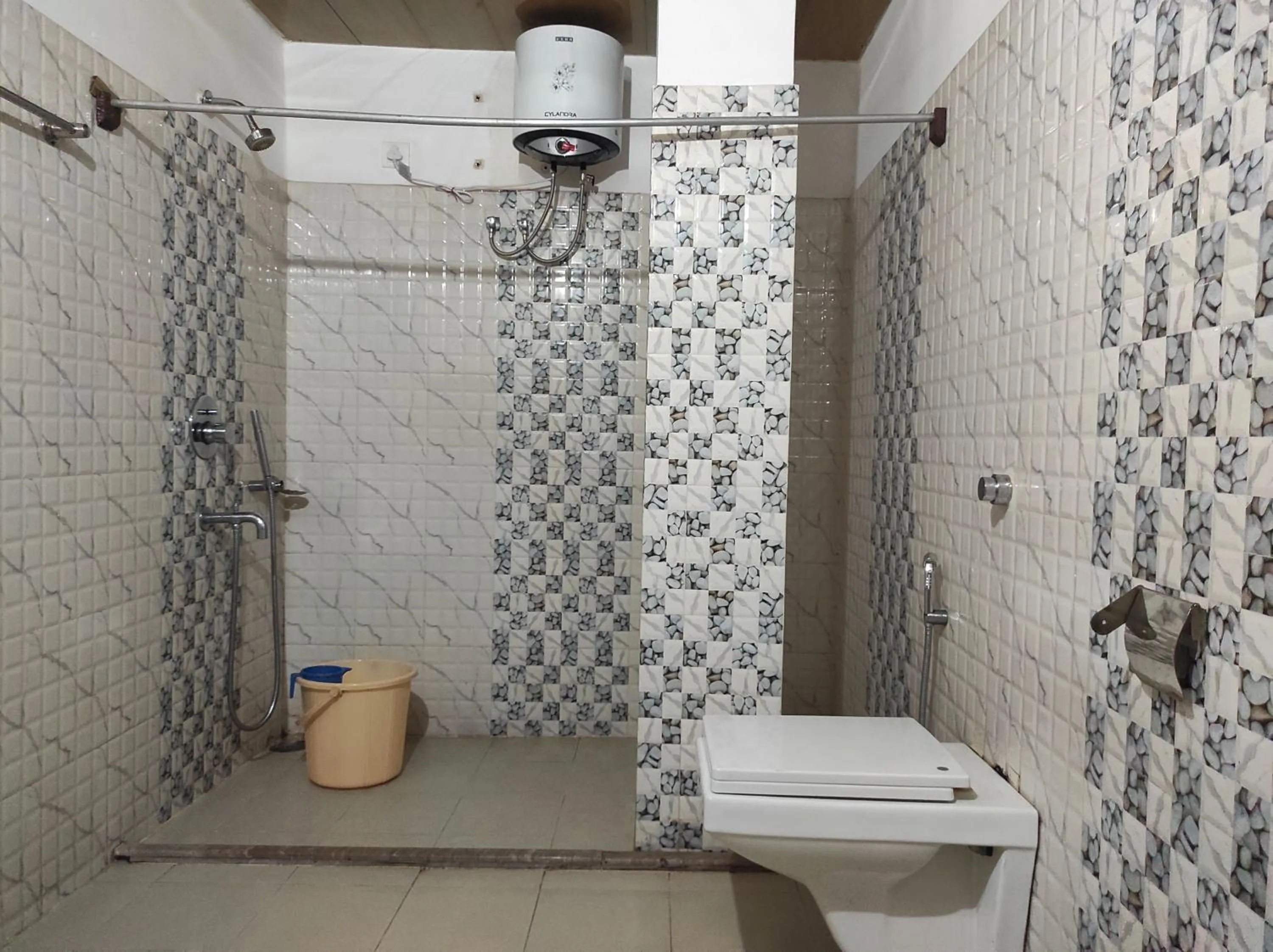 Shower in Hotel Sanjivani Heritage Top Best Budget Hotels in Dibrugarh, Assam