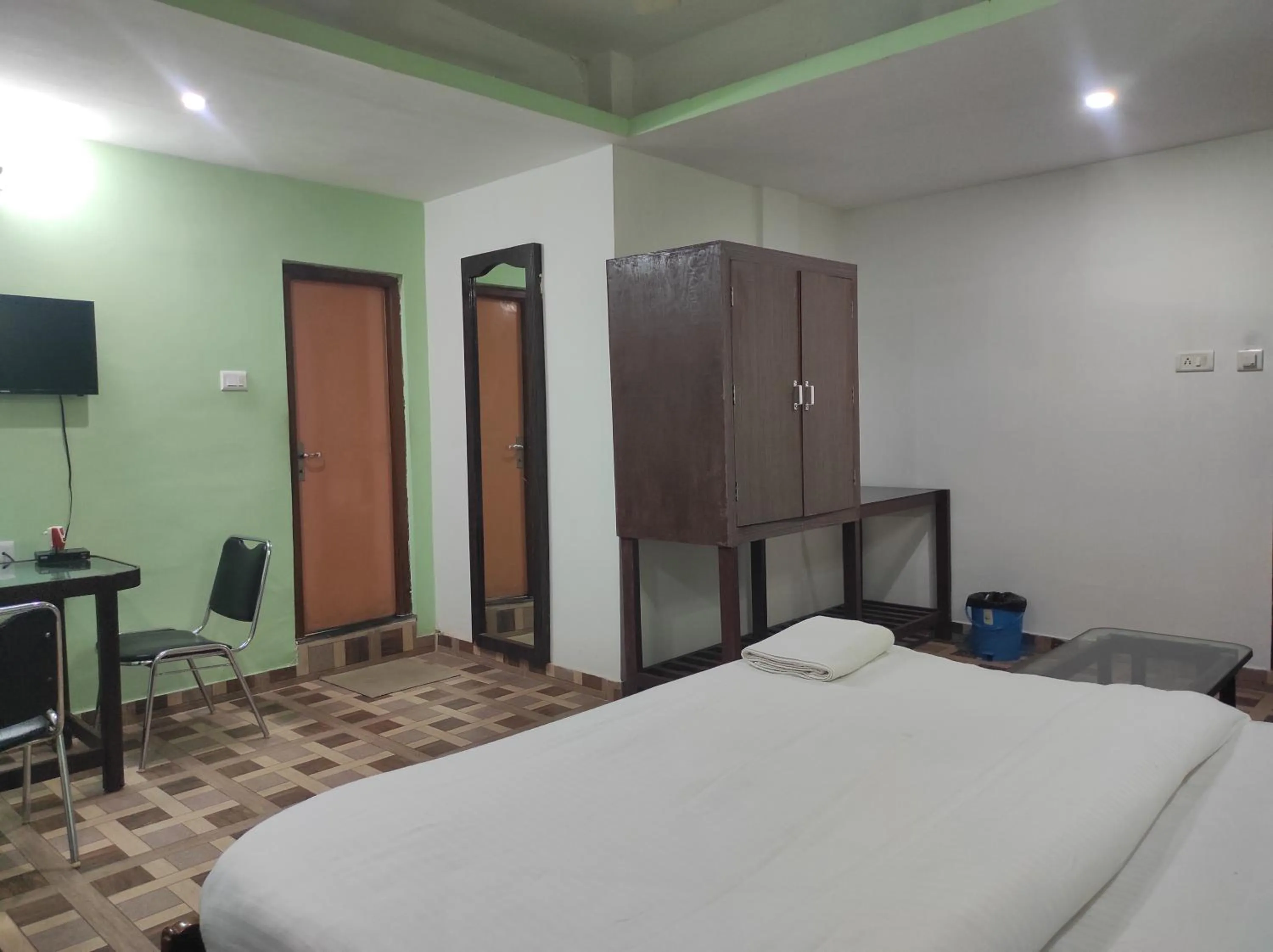 Bed in Hotel Sanjivani Heritage Top Best Budget Hotels in Dibrugarh, Assam