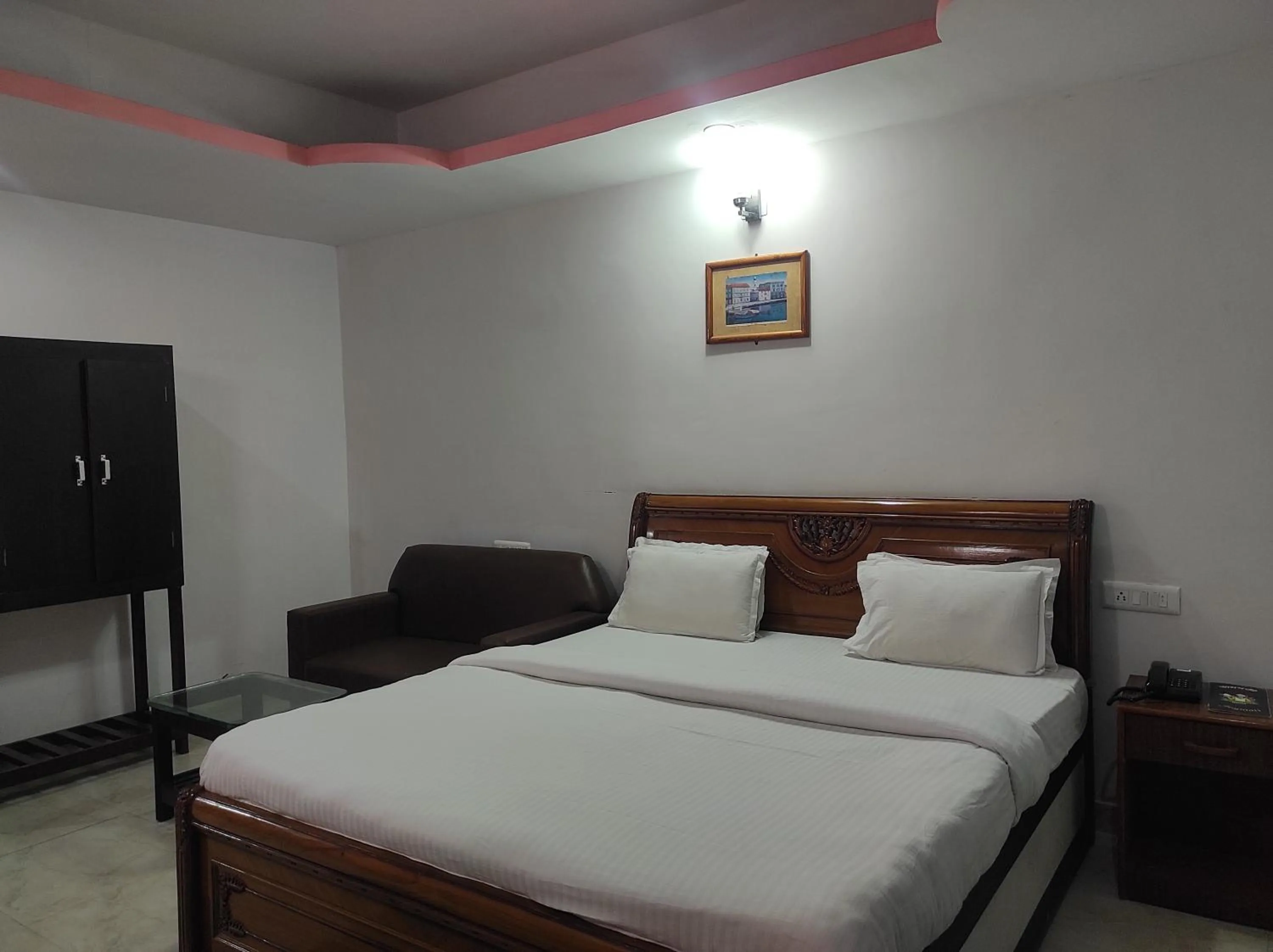 Bed in Hotel Sanjivani Heritage Top Best Budget Hotels in Dibrugarh, Assam