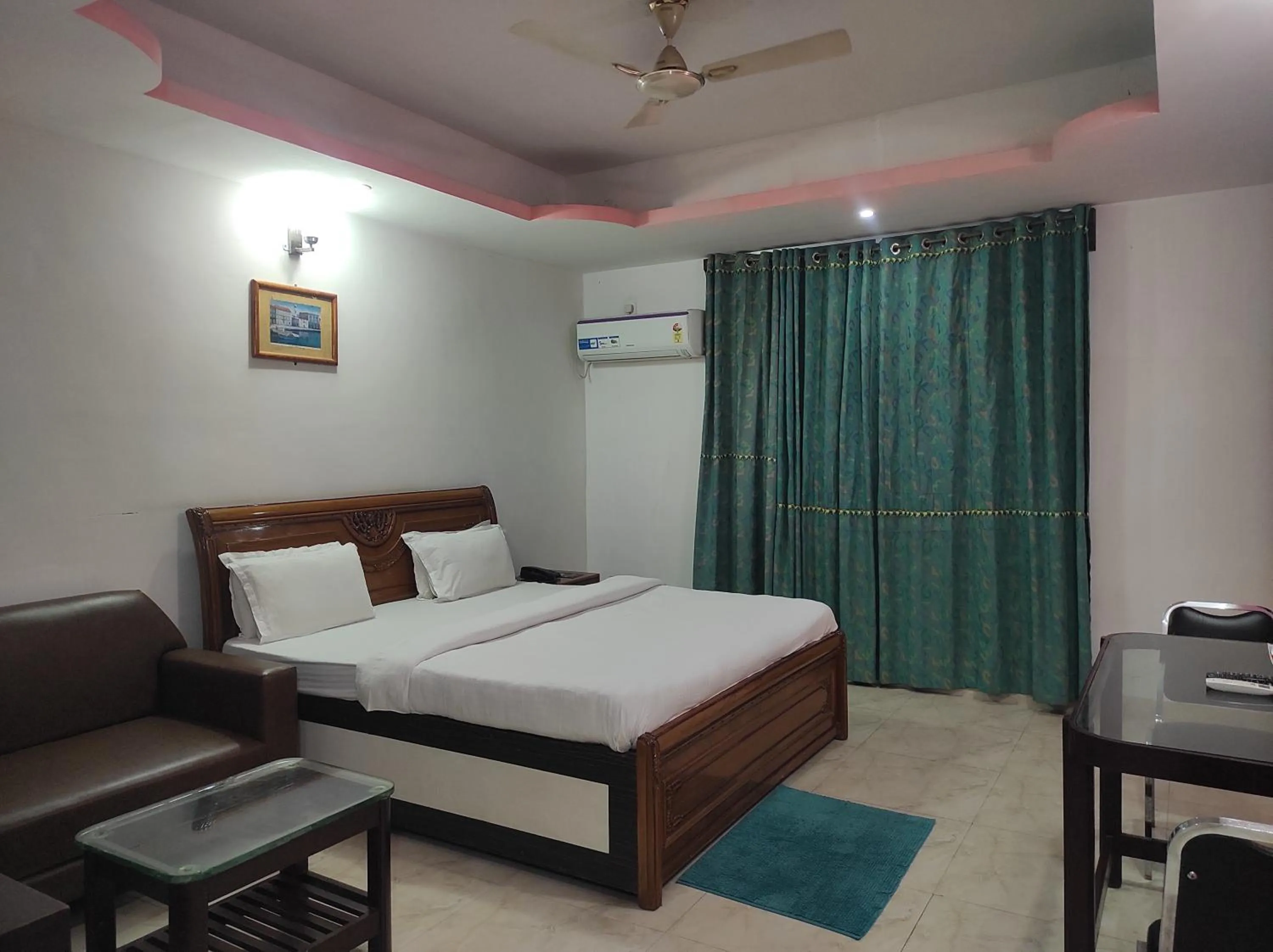 Bed in Hotel Sanjivani Heritage Top Best Budget Hotels in Dibrugarh, Assam