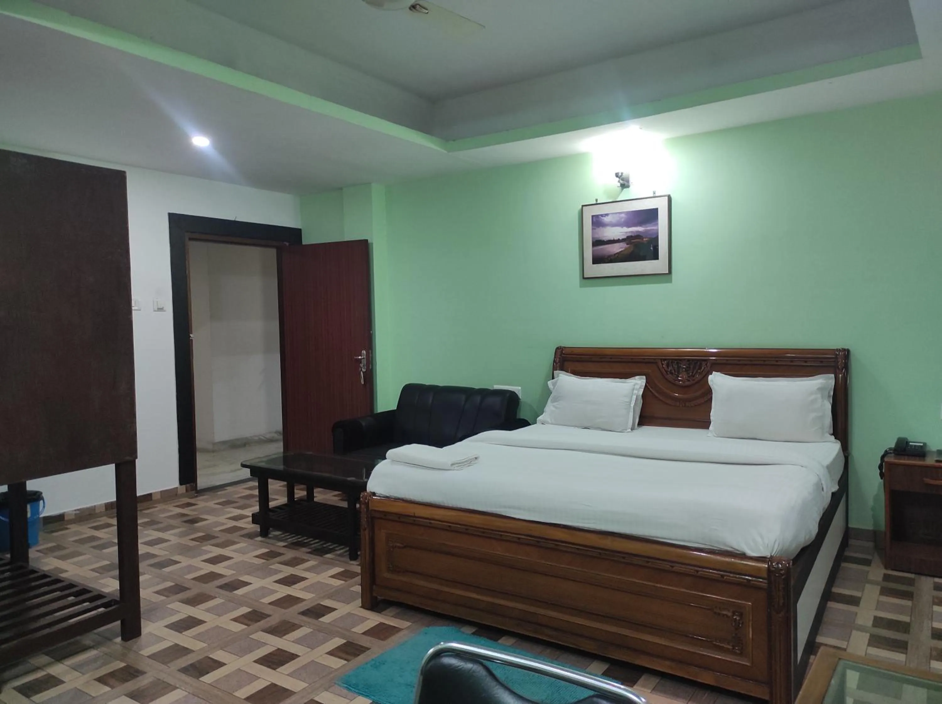 Bed in Hotel Sanjivani Heritage Top Best Budget Hotels in Dibrugarh, Assam
