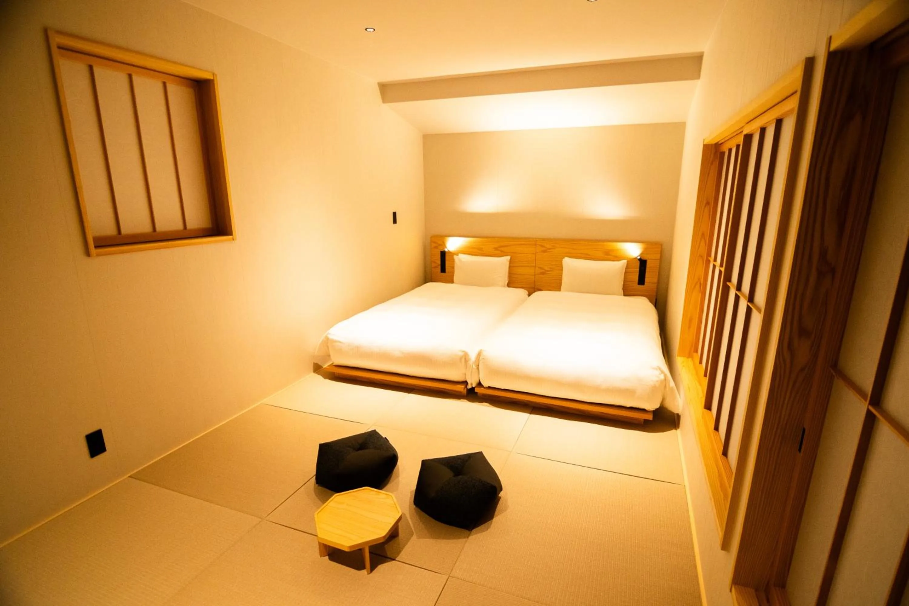 Bed in Auberge Homachi Mikuniminato