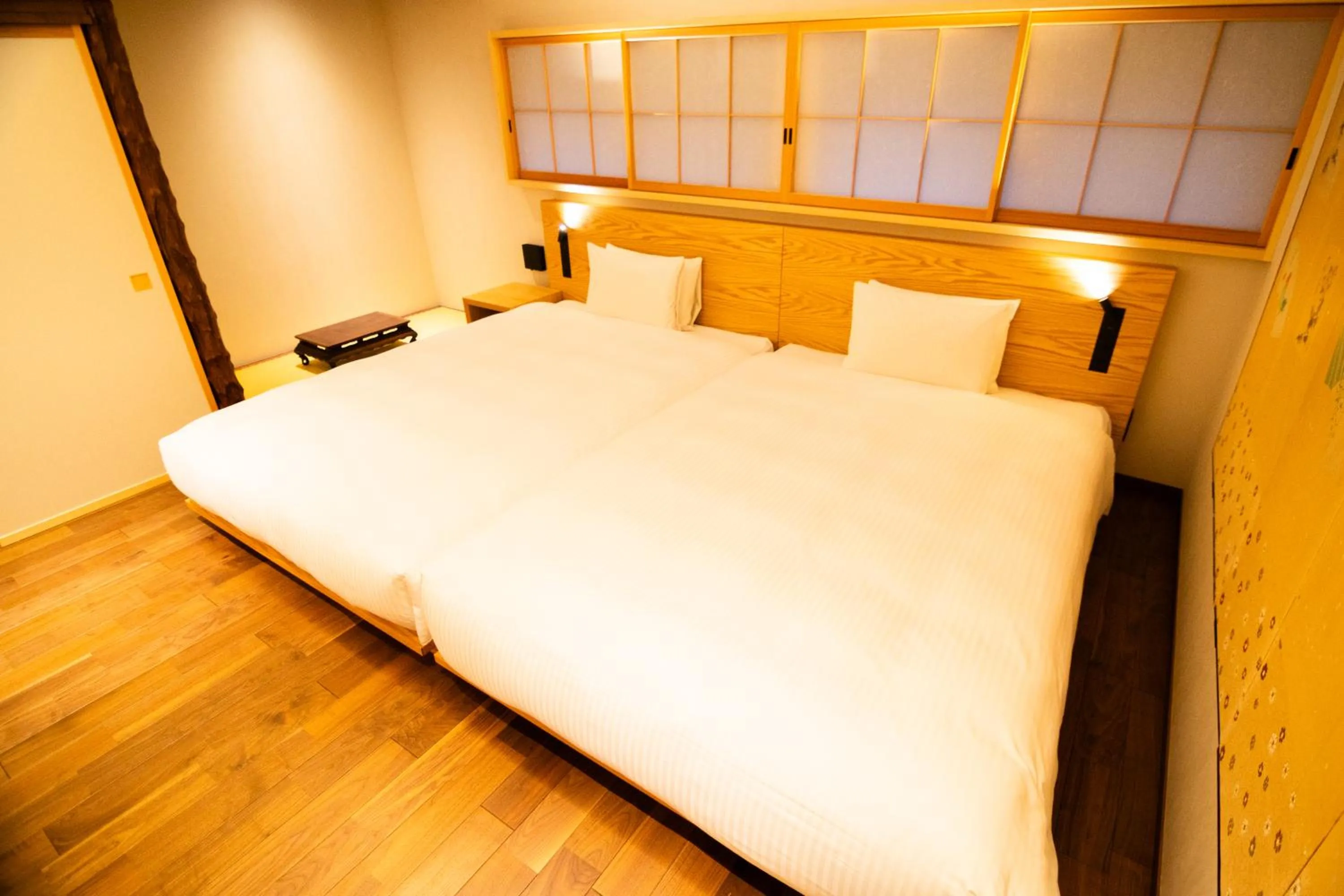 Bed in Auberge Homachi Mikuniminato