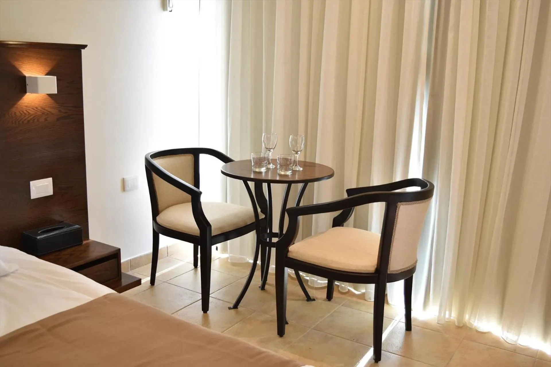 Dining area, Bed in Sands Hotel