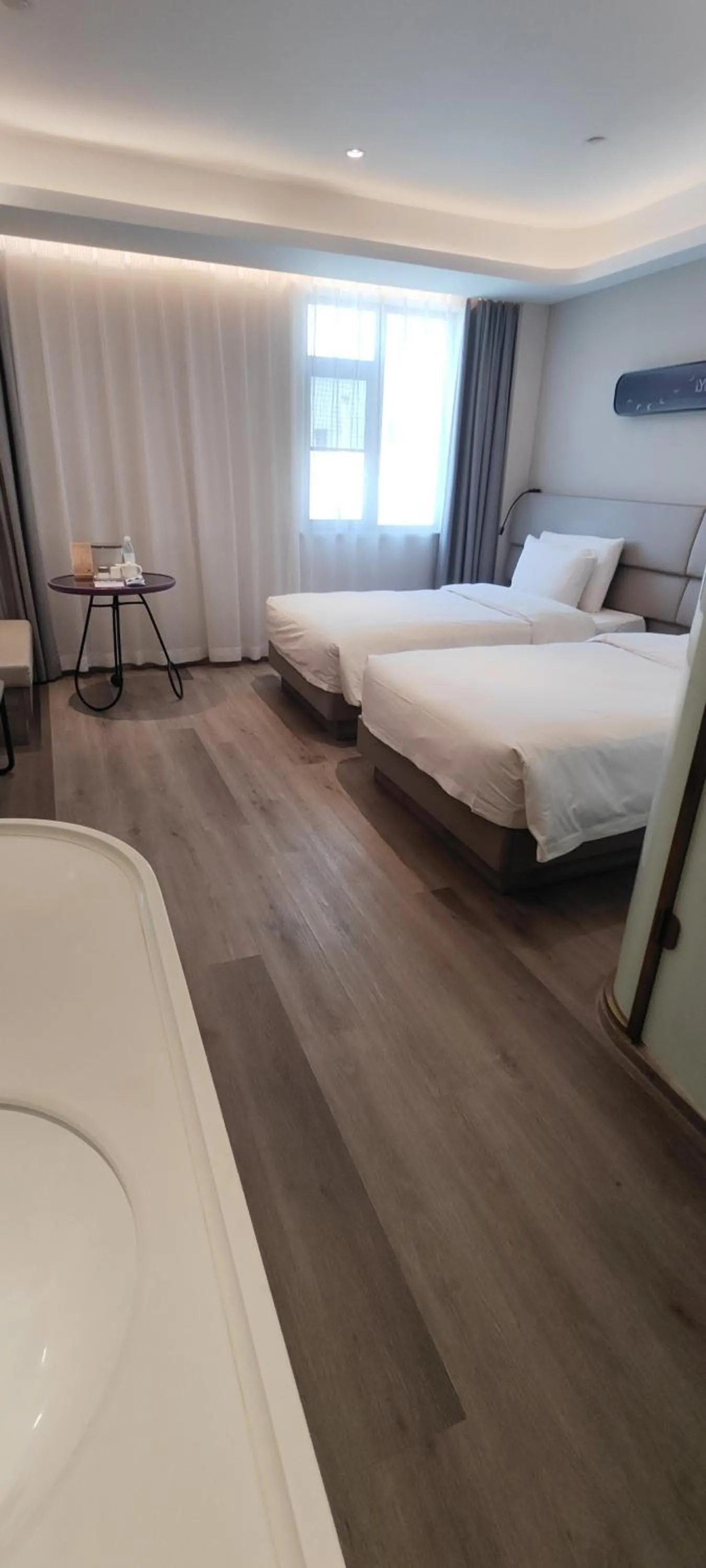 Bed in Atour Light Hotel Shanghai Xujiahui Jiaotong University
