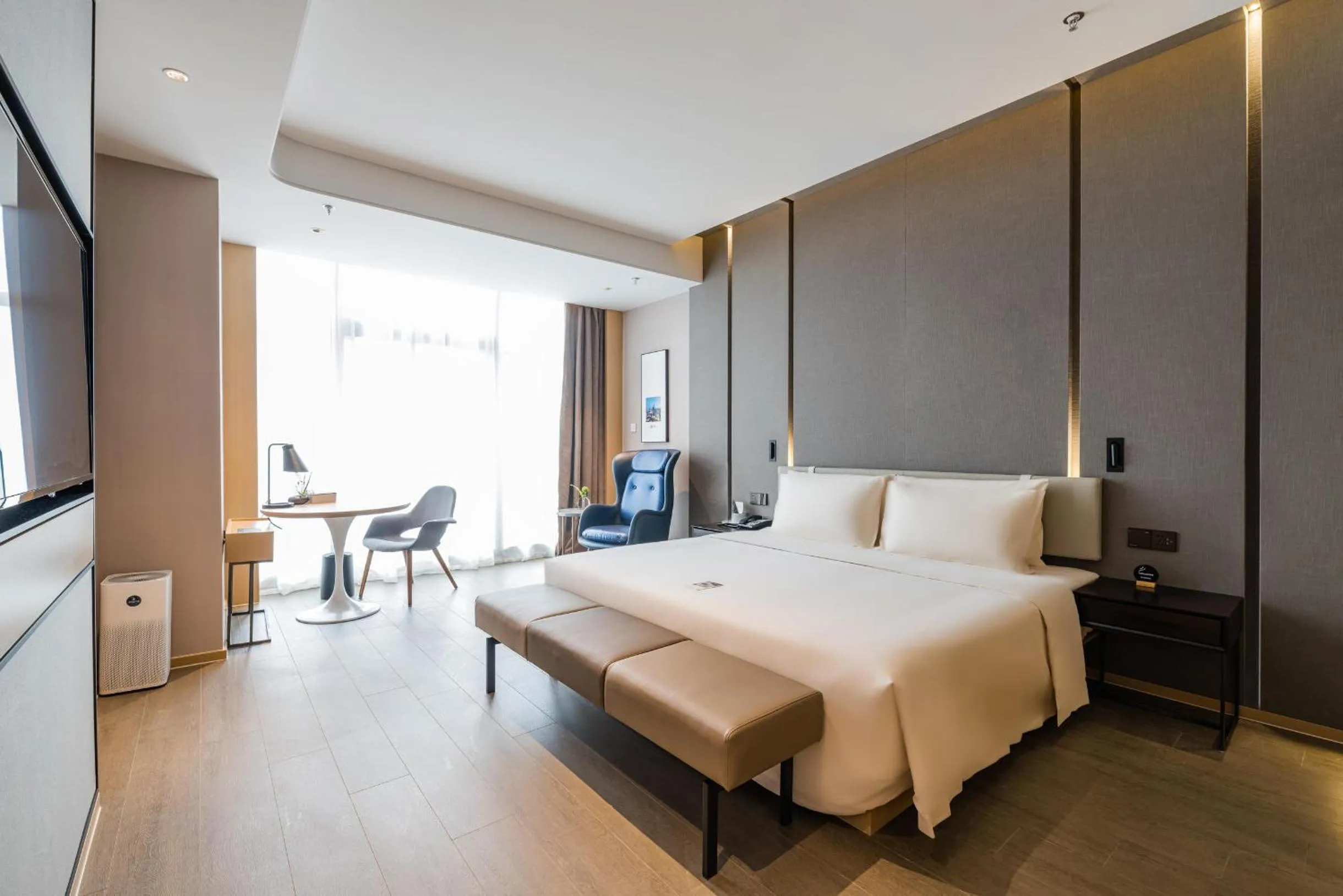 Bed in Atour Hotel Wuxi Coast City
