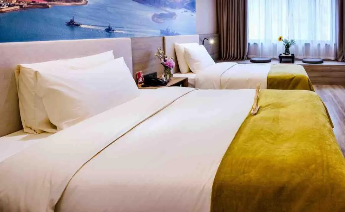 Bed in Atour Hotel Dalian Zhongshan Square