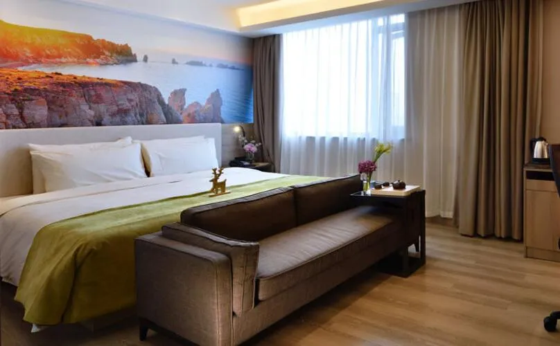 Bed in Atour Hotel Dalian Zhongshan Square