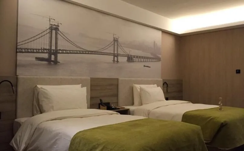 Bed in Atour Hotel Dalian Zhongshan Square