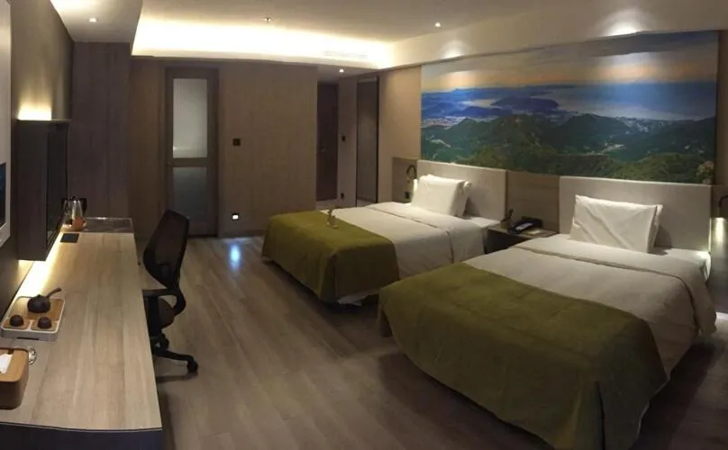 Bed in Atour Hotel Dalian Zhongshan Square