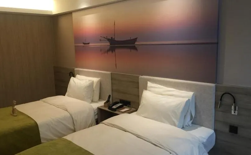 Bed in Atour Hotel Dalian Zhongshan Square