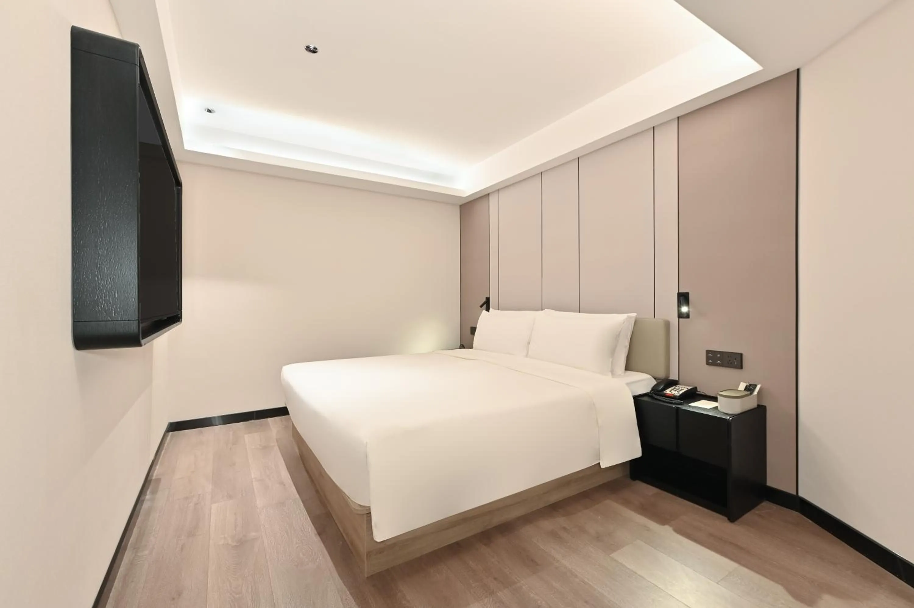 Bed in Atour Hotel Dalian Zhongshan Square