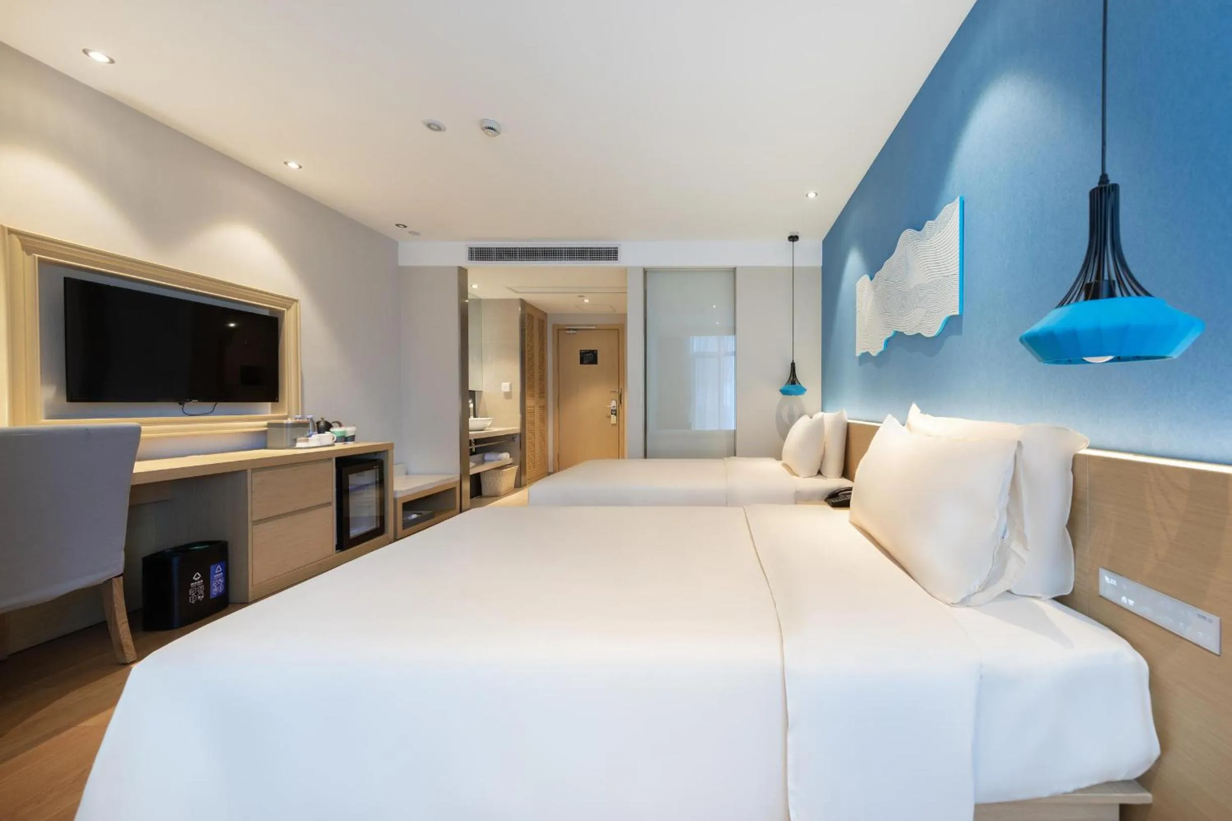 Bed in Atour X Hotel Hangzhou Binjiang Jiangnan Avenue