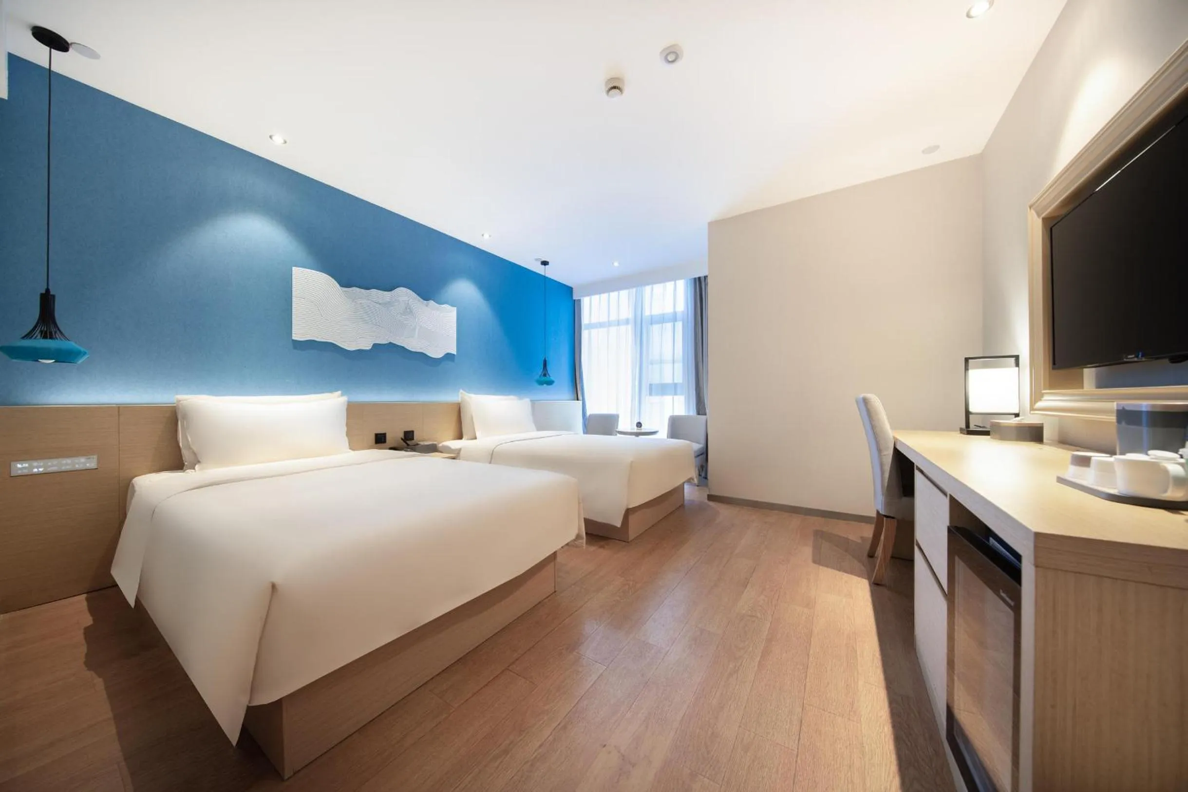 Bed in Atour X Hotel Hangzhou Binjiang Jiangnan Avenue