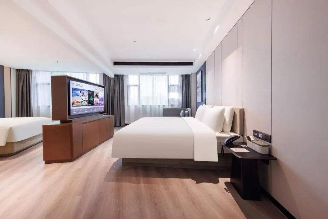 Bed in Atour X Hotel Guangzhou Baiyun International Airport Renhe Station
