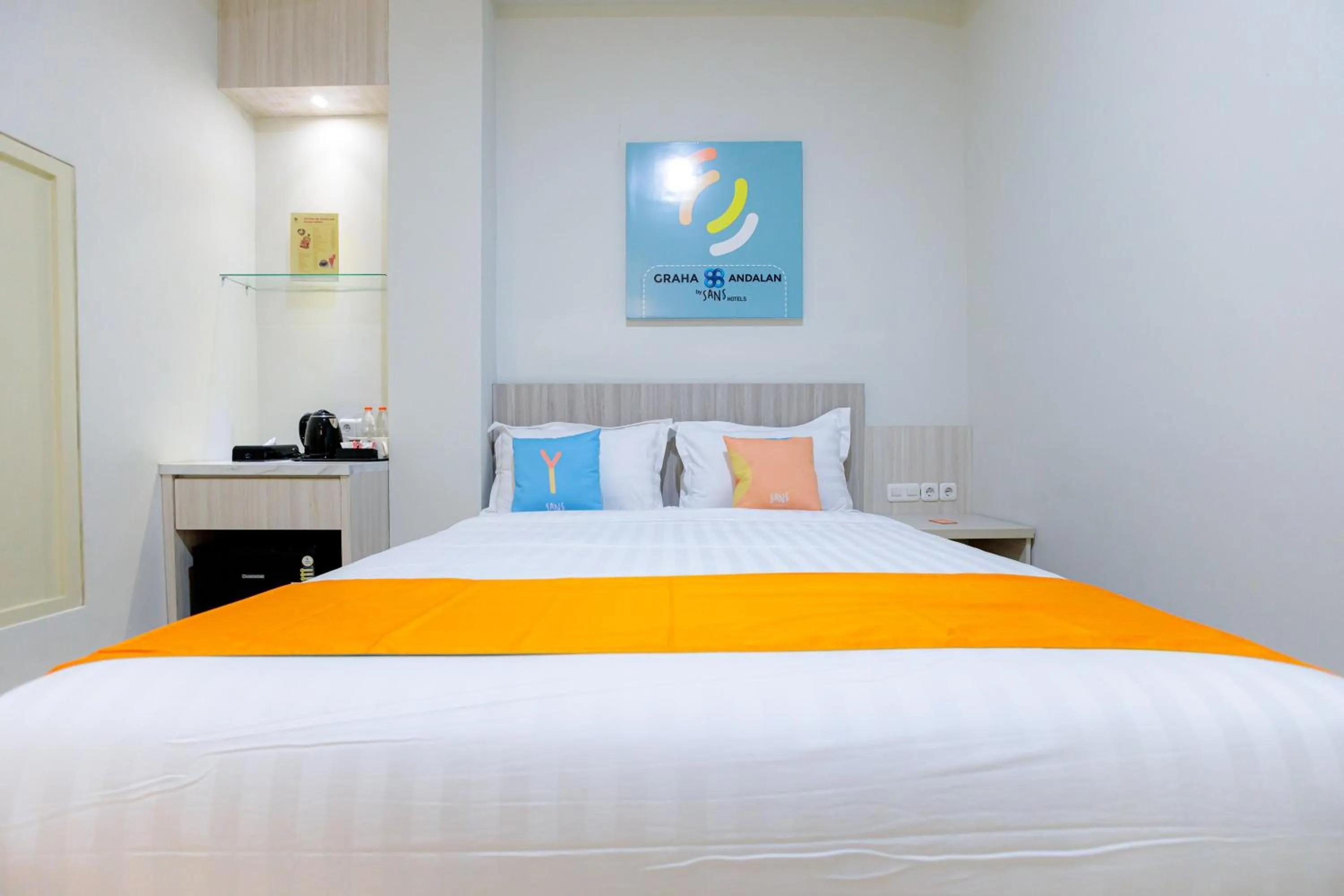 Bed in Sans Hotel 88 Andalan Surabaya by RedDoorz