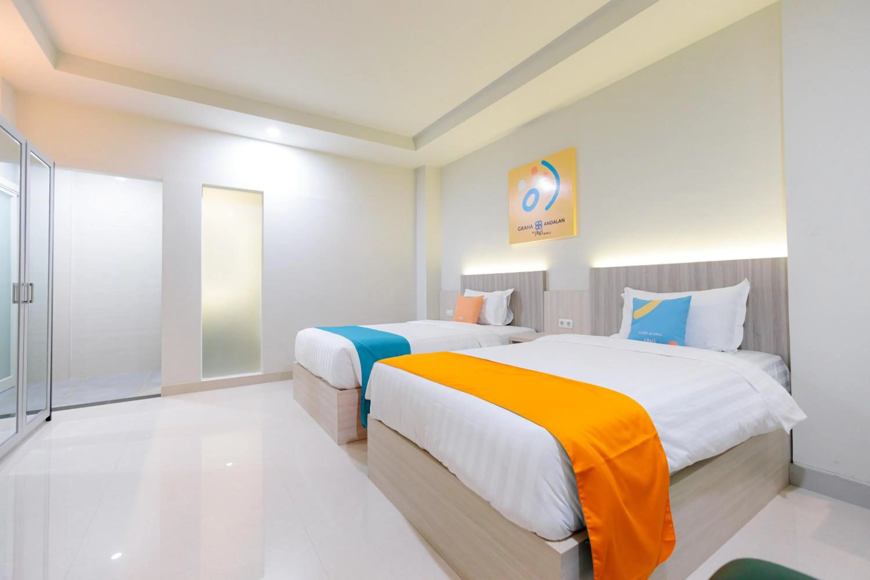 Bed in Sans Hotel 88 Andalan Surabaya by RedDoorz