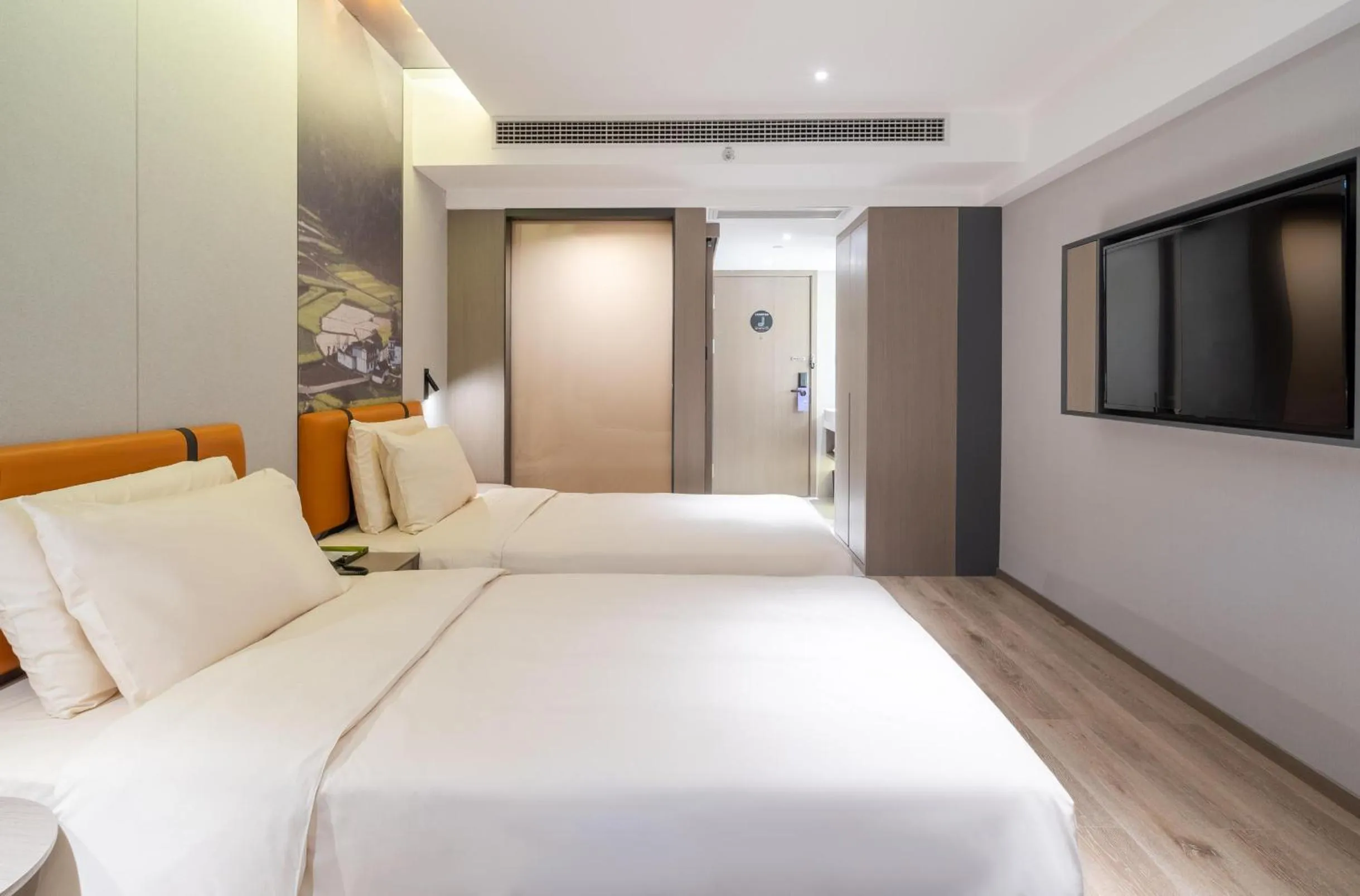 Bed in Atour Light Hotel Guiyang Fountain