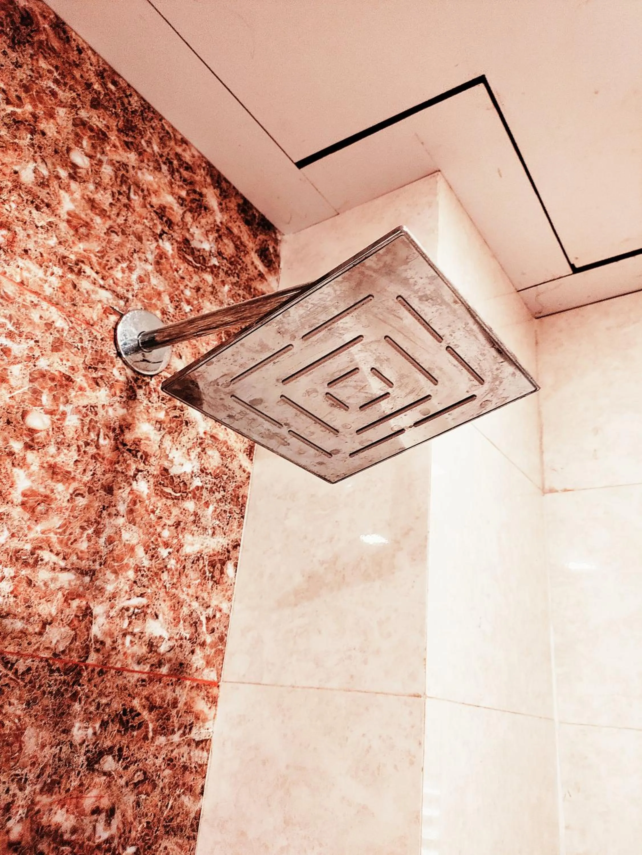 Shower in Sambhabana Hotel & Suites