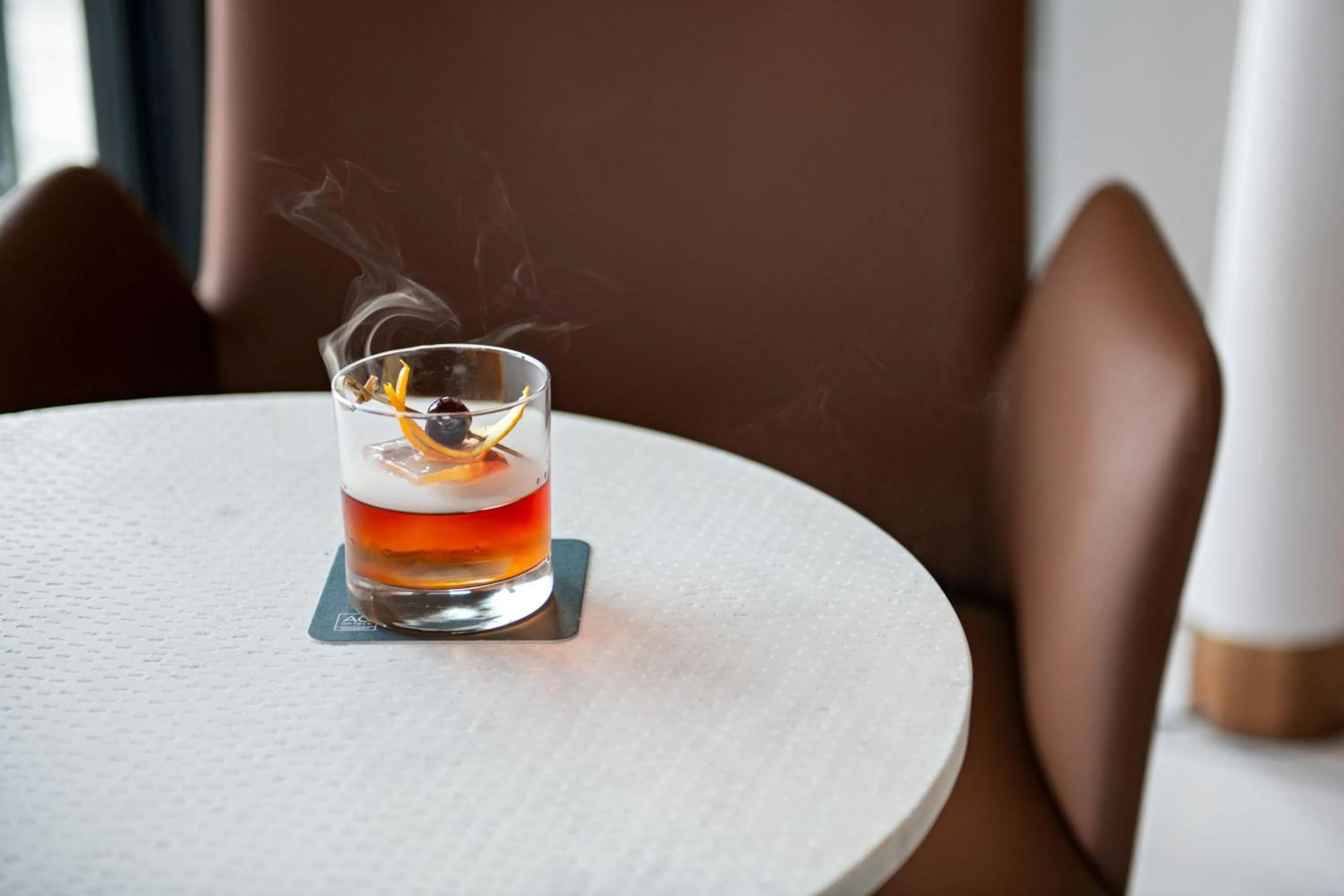 Lounge or bar in AC Hotel by Marriott Waco Downtown