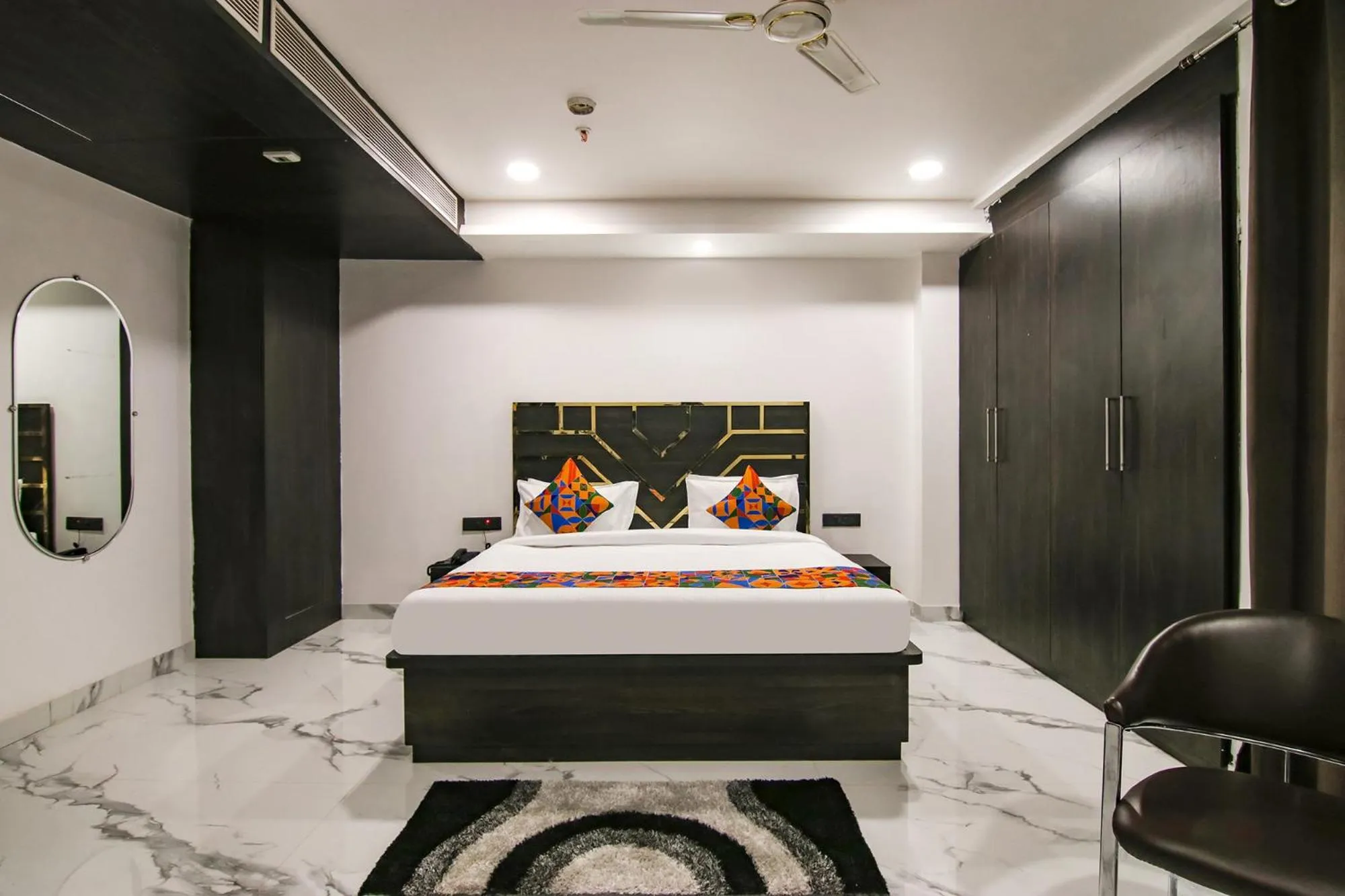 Bed in FabHotel Sky Suites Karkardooma