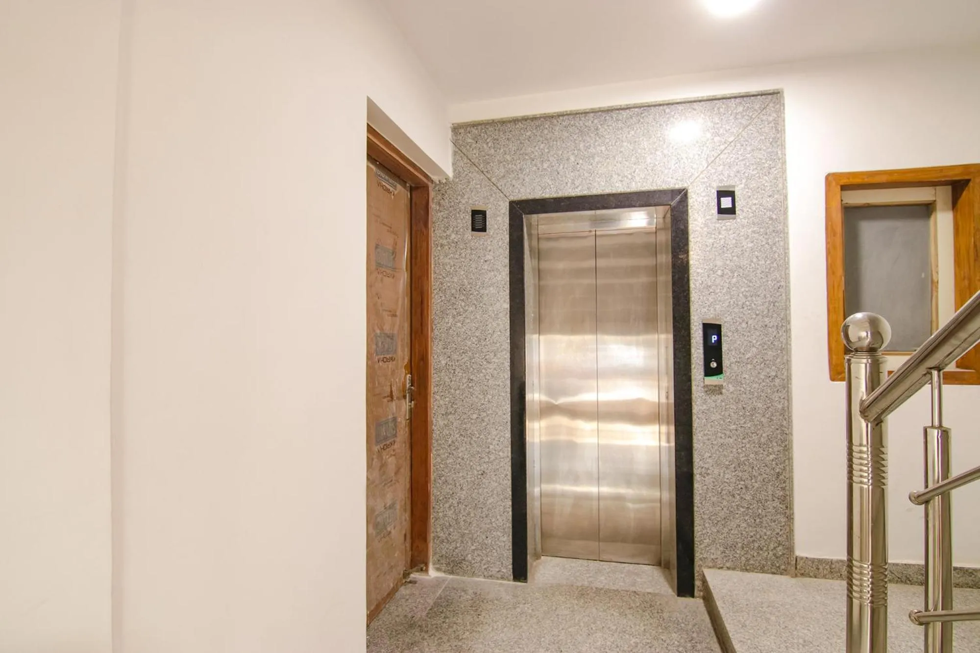 elevator in FabHotel La Serene BnB- Ashok Vihar