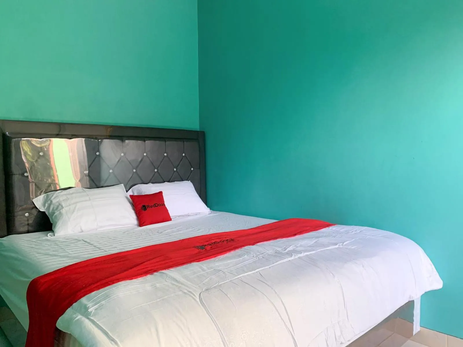 Bed in RedDoorz @ Langkapura Lampung