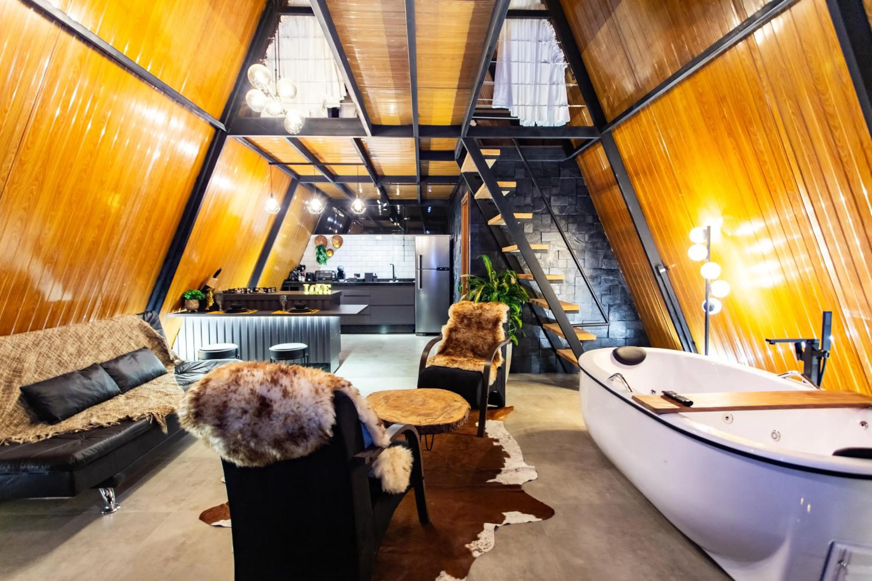 Communal lounge/ TV room in Chalés Quinta da Boa Vista