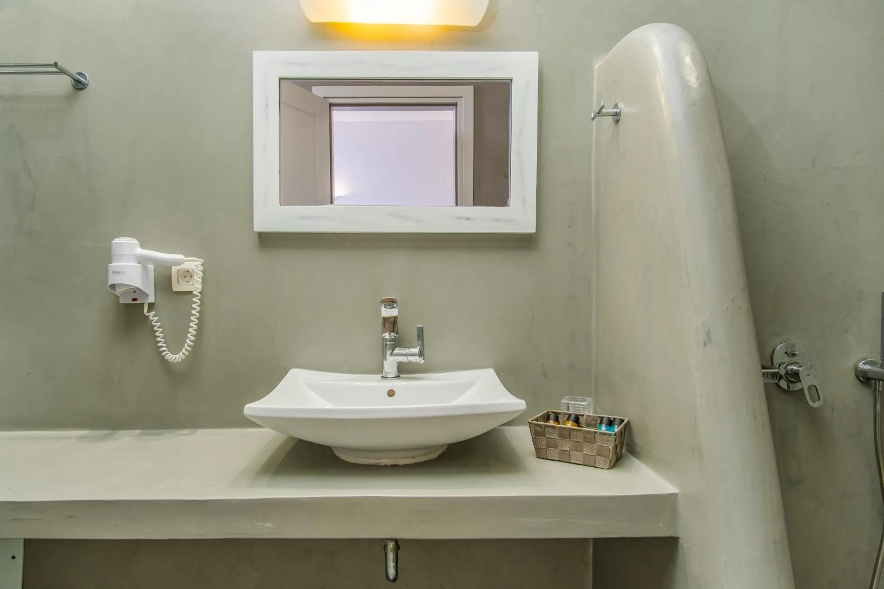Bathroom in Central Fira Suites
