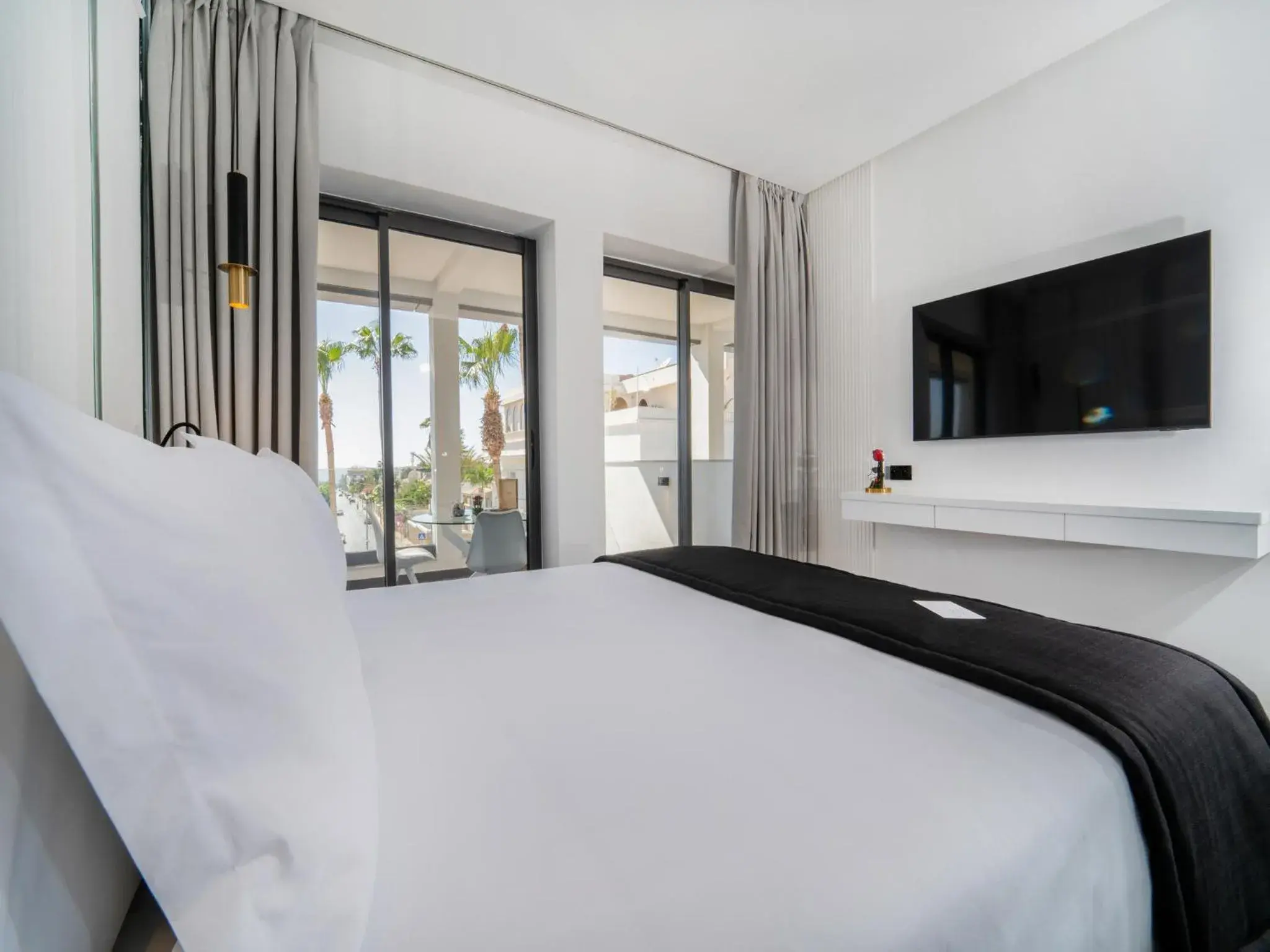 Bed in Petit Palace Suites Hotel Bed in Petit Palace Suites Hotel